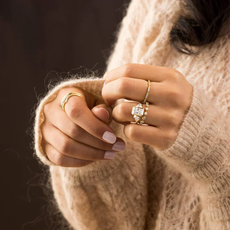 close-up-of-a-hand-wearing-radiant-cut-moissanite-engagement-ring