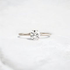 golden-promise-glow-1.0ct-round-cut-moissanite-diamond-engagement-hidden-halo-ring