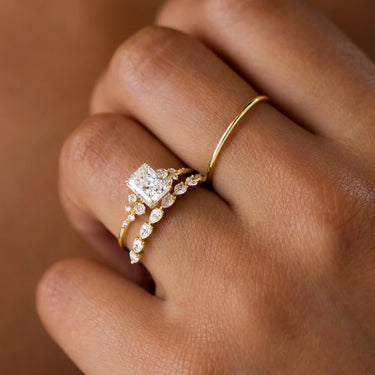 1.03ct-radiant-cut-moissanite-cluster-engagement-ring-in-yellow-gold-gemfora