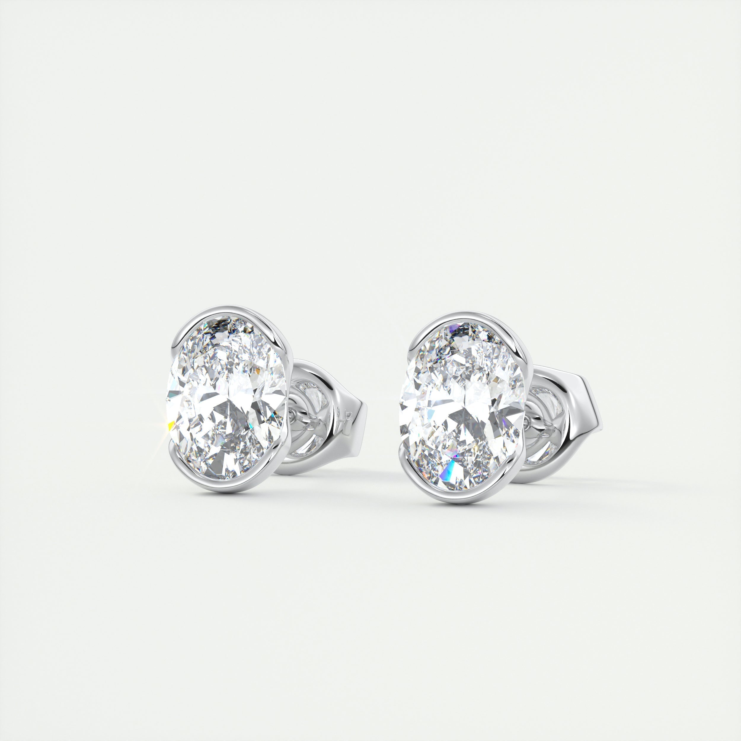 1.0CT Oval Half Bezel Solitaire G-VS Lab Grown Diamond Earrings