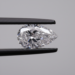 Pear-shaped diamond on a black background