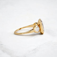 bezel-emerald-moissanite-engagement-ring-pear-side-sparkle-stones-3-ct-yellow-gold-gemfora-3