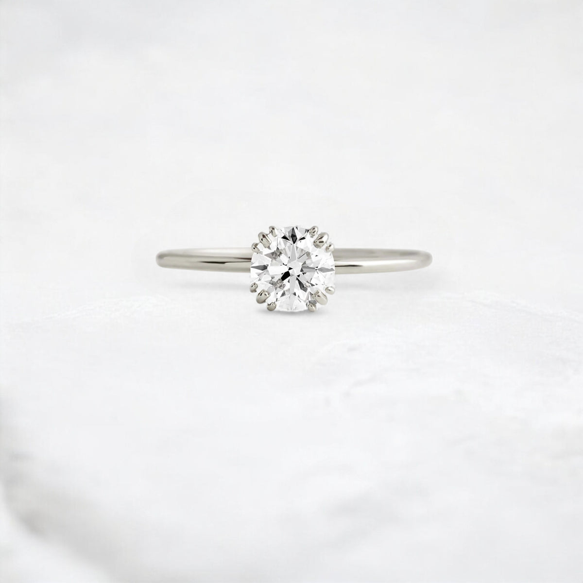 dawnfire-sparkle-round-cut-cluster-moissanite-engagement-ring-0-70-ct-platinum-gemfora-1