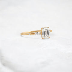 emerald-embrace-moissanite-engagement-solitaire-love-ring-1-20-ct-yellow-gold-gemfora-2