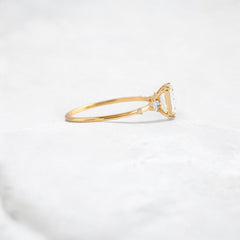 emerald-embrace-moissanite-engagement-solitaire-love-ring-1-20-ct-yellow-gold-gemfora-3
