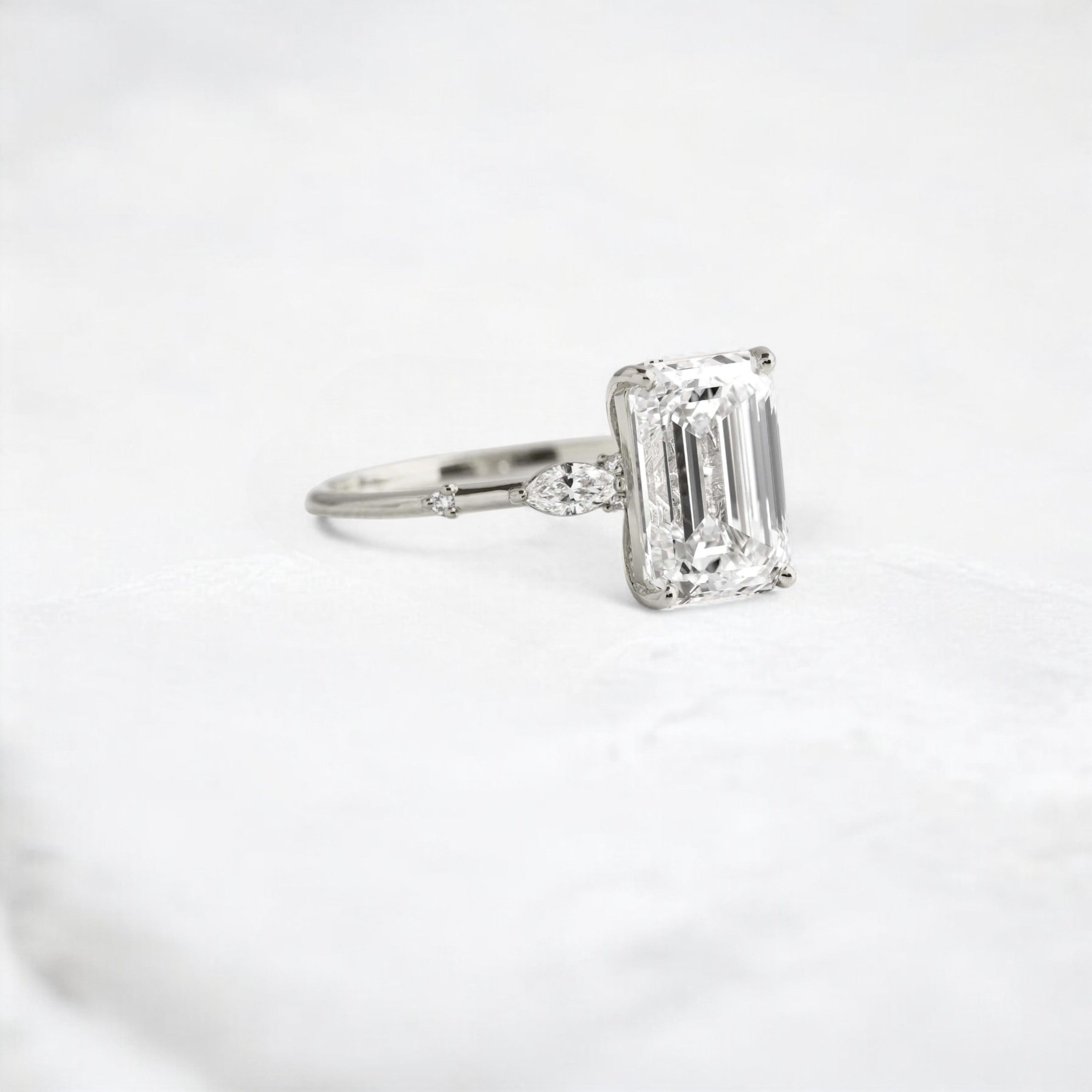 emerald-embrace-moissanite-engagement-solitaire-love-ring-2-70-ct-platinum-gemfora-2