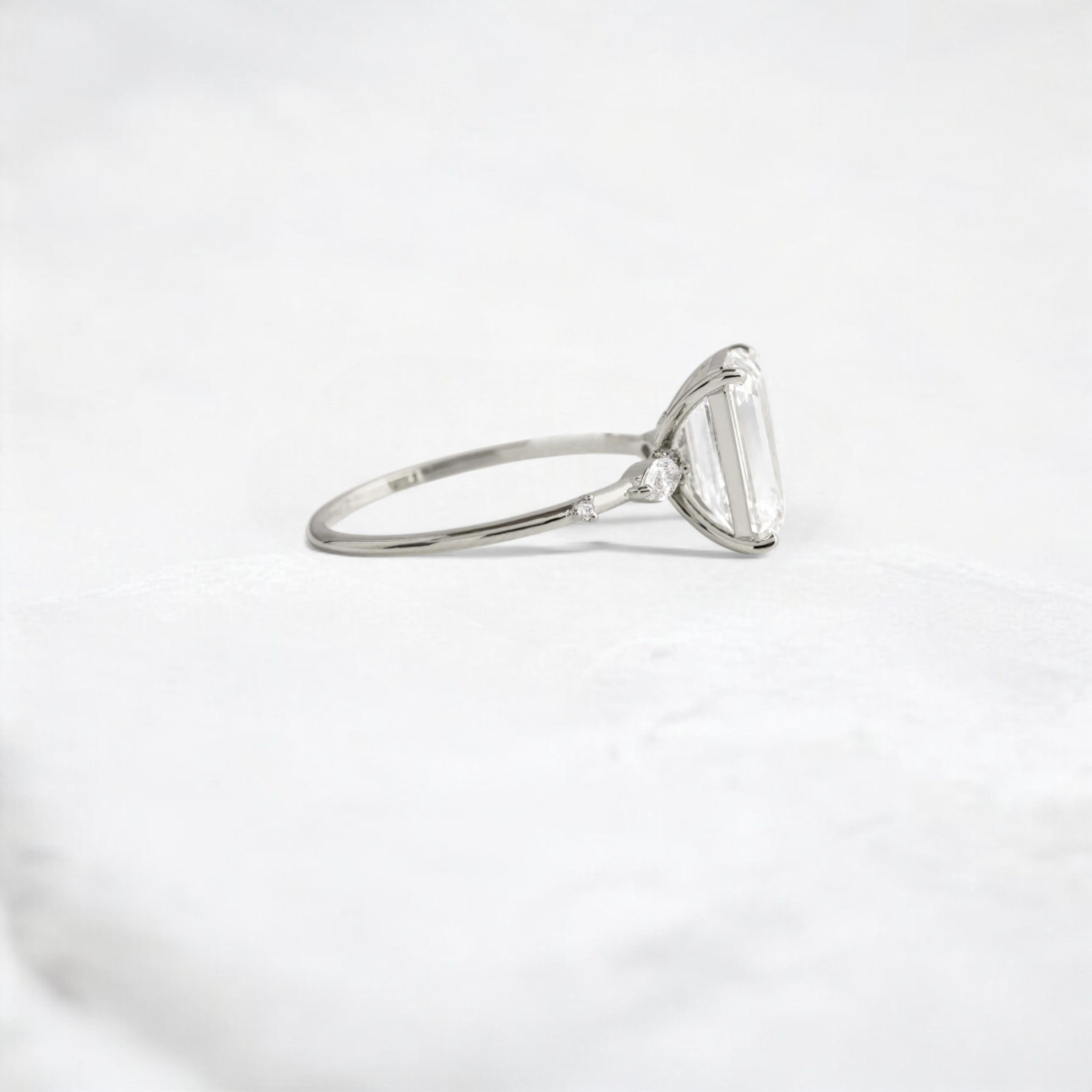 emerald-embrace-moissanite-engagement-solitaire-love-ring-2-70-ct-platinum-gemfora-3