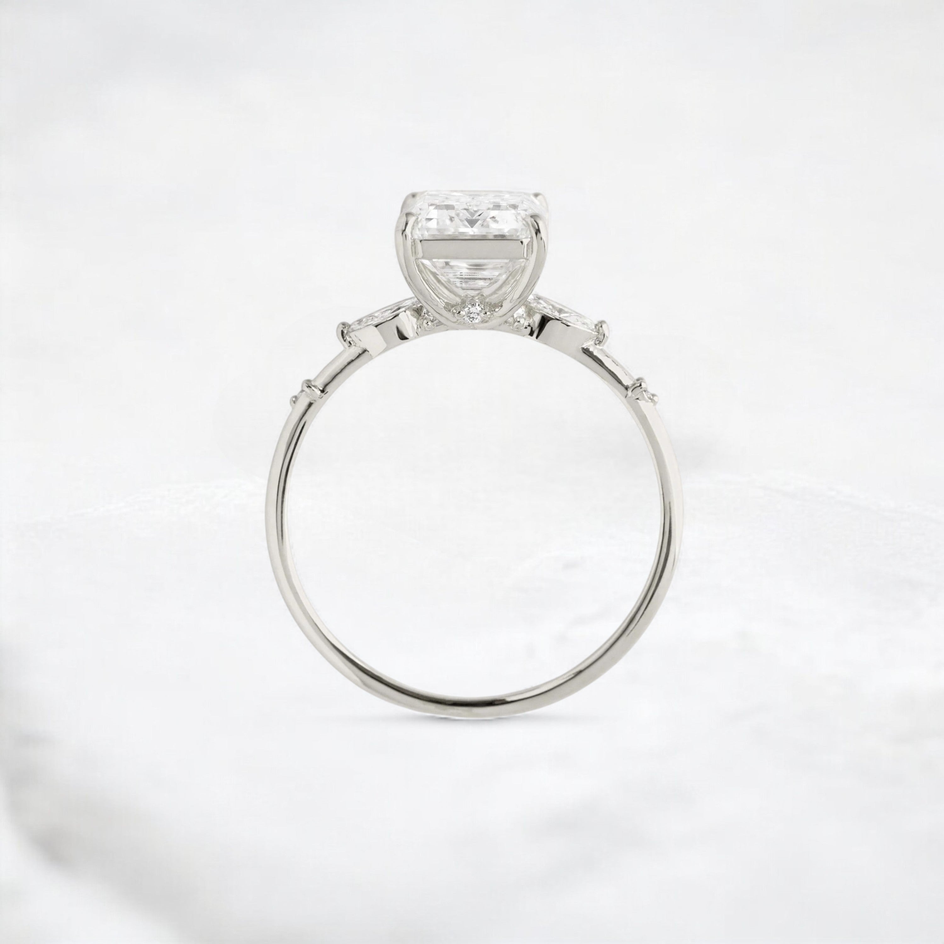emerald-embrace-moissanite-engagement-solitaire-love-ring-2-70-ct-platinum-gemfora-4