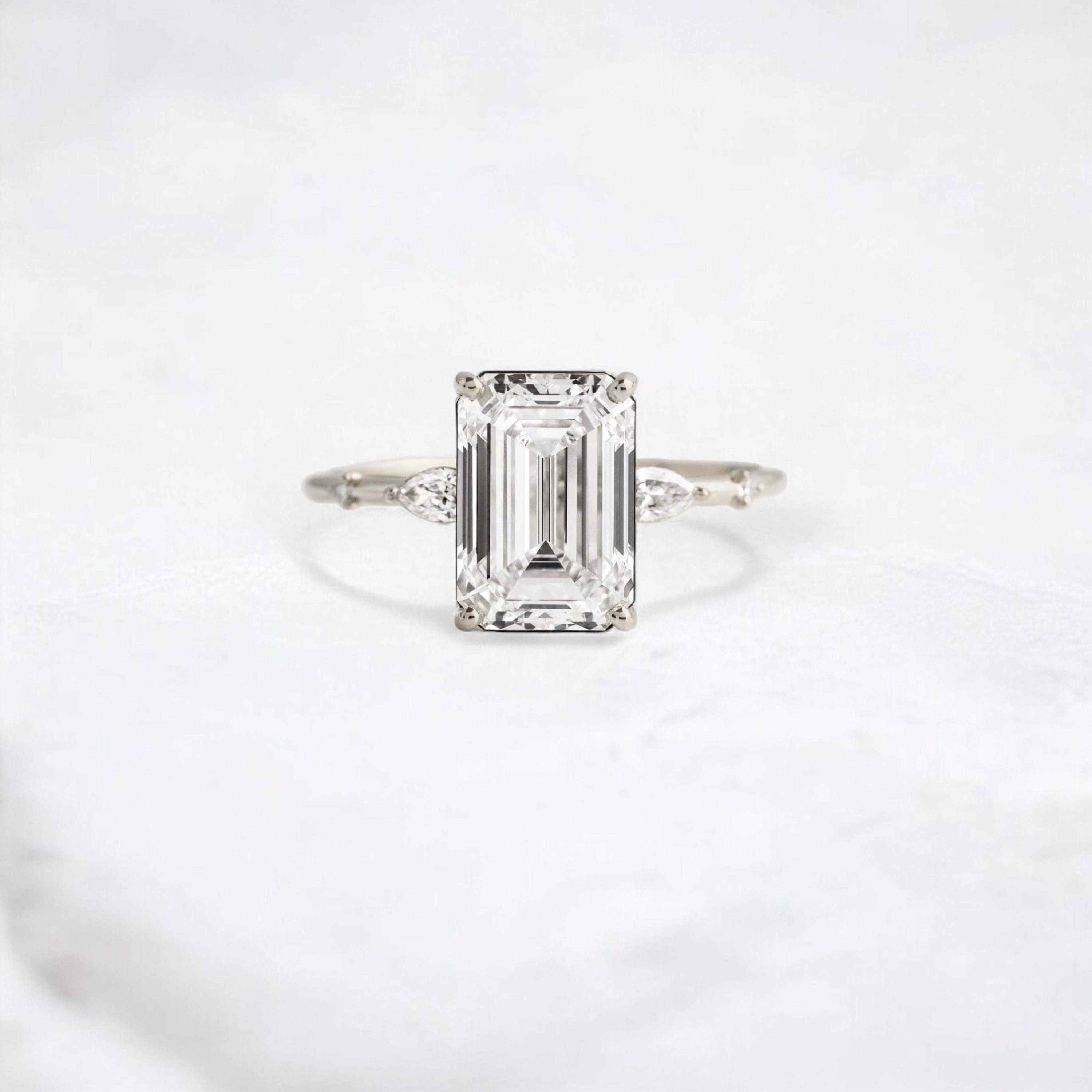 emerald-embrace-moissanite-engagement-solitaire-love-ring-2-70-ct-white-gold-gemfora-1