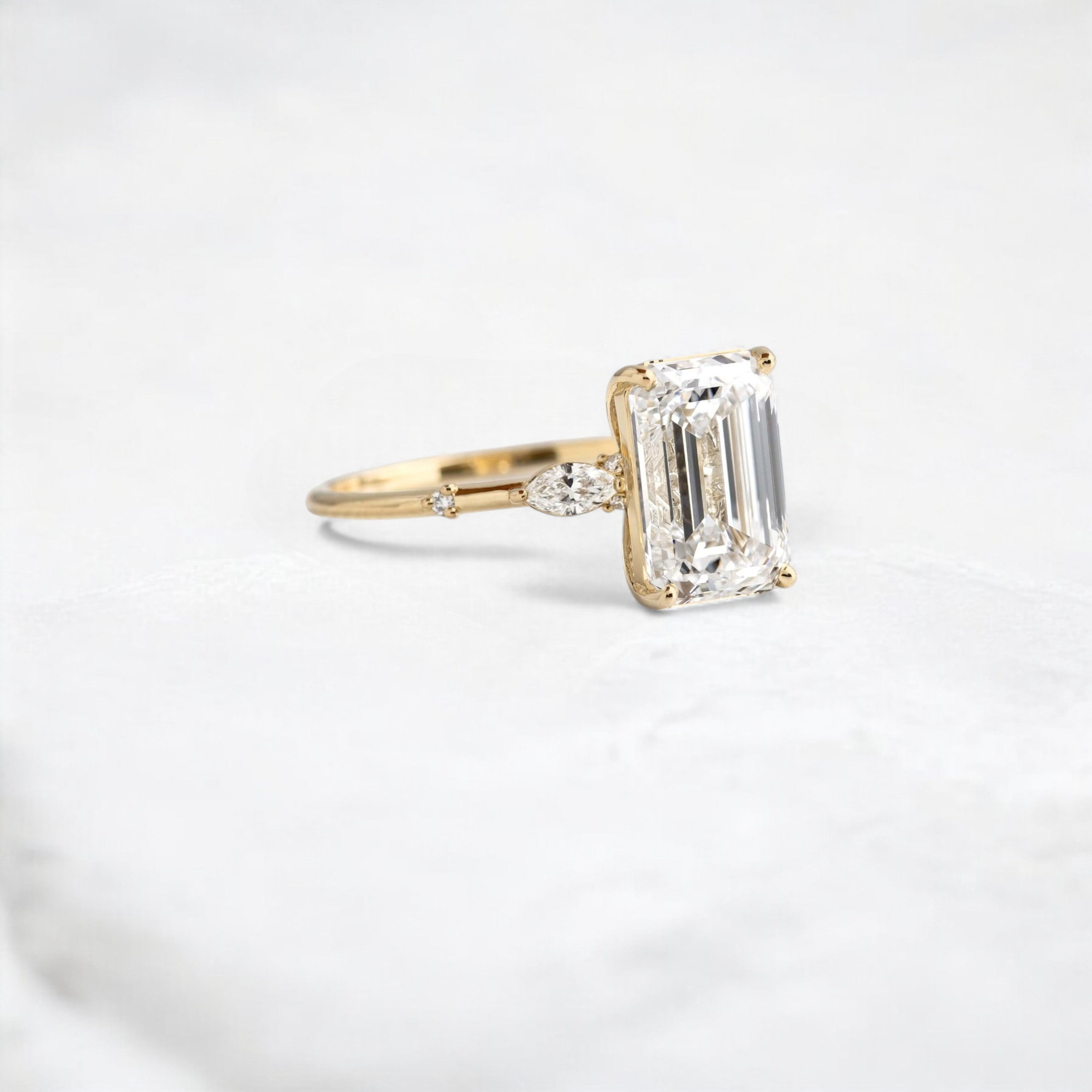 emerald-embrace-moissanite-engagement-solitaire-love-ring-2-70-ct-yellow-gold-gemfora-2
