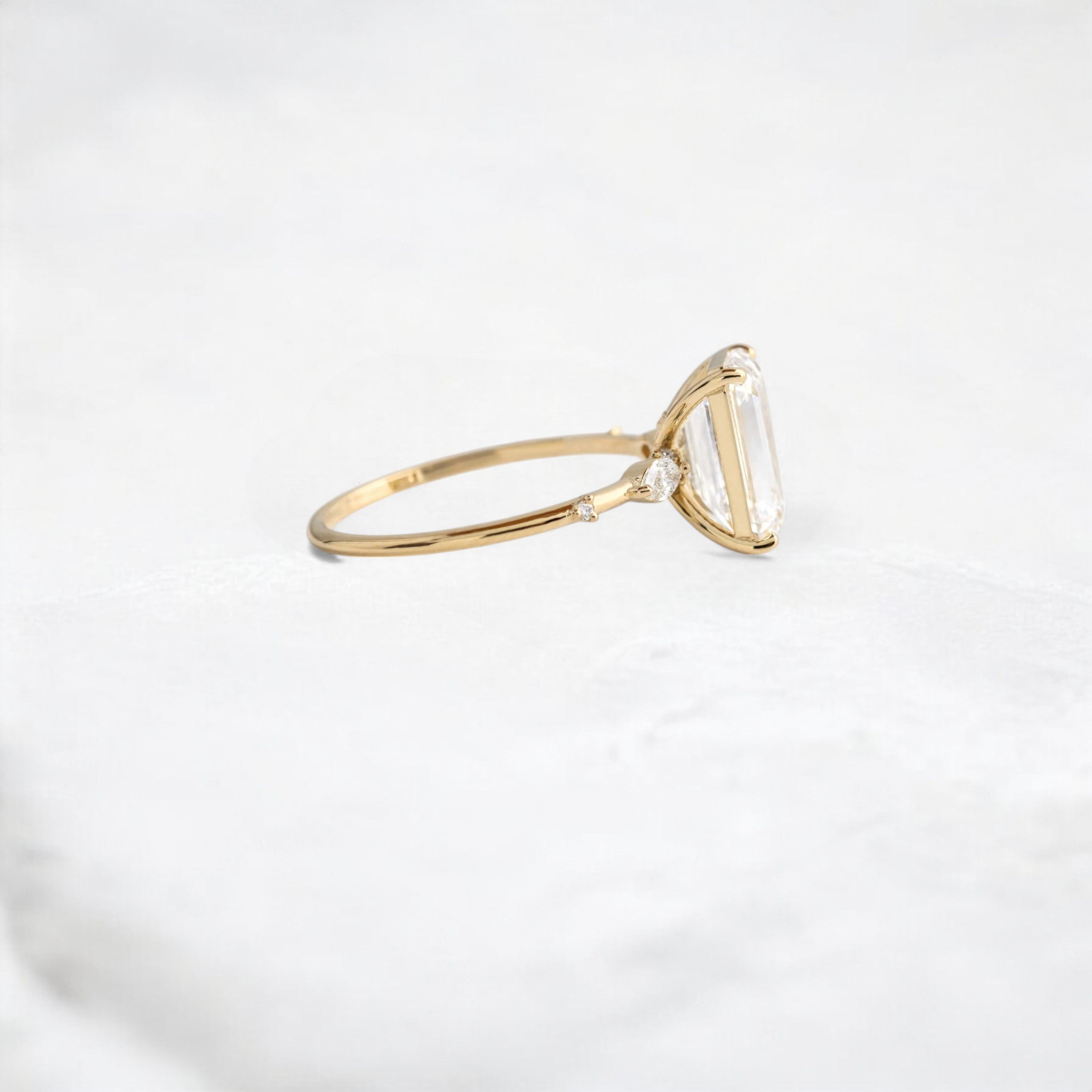 emerald-embrace-moissanite-engagement-solitaire-love-ring-2-70-ct-yellow-gold-gemfora-3