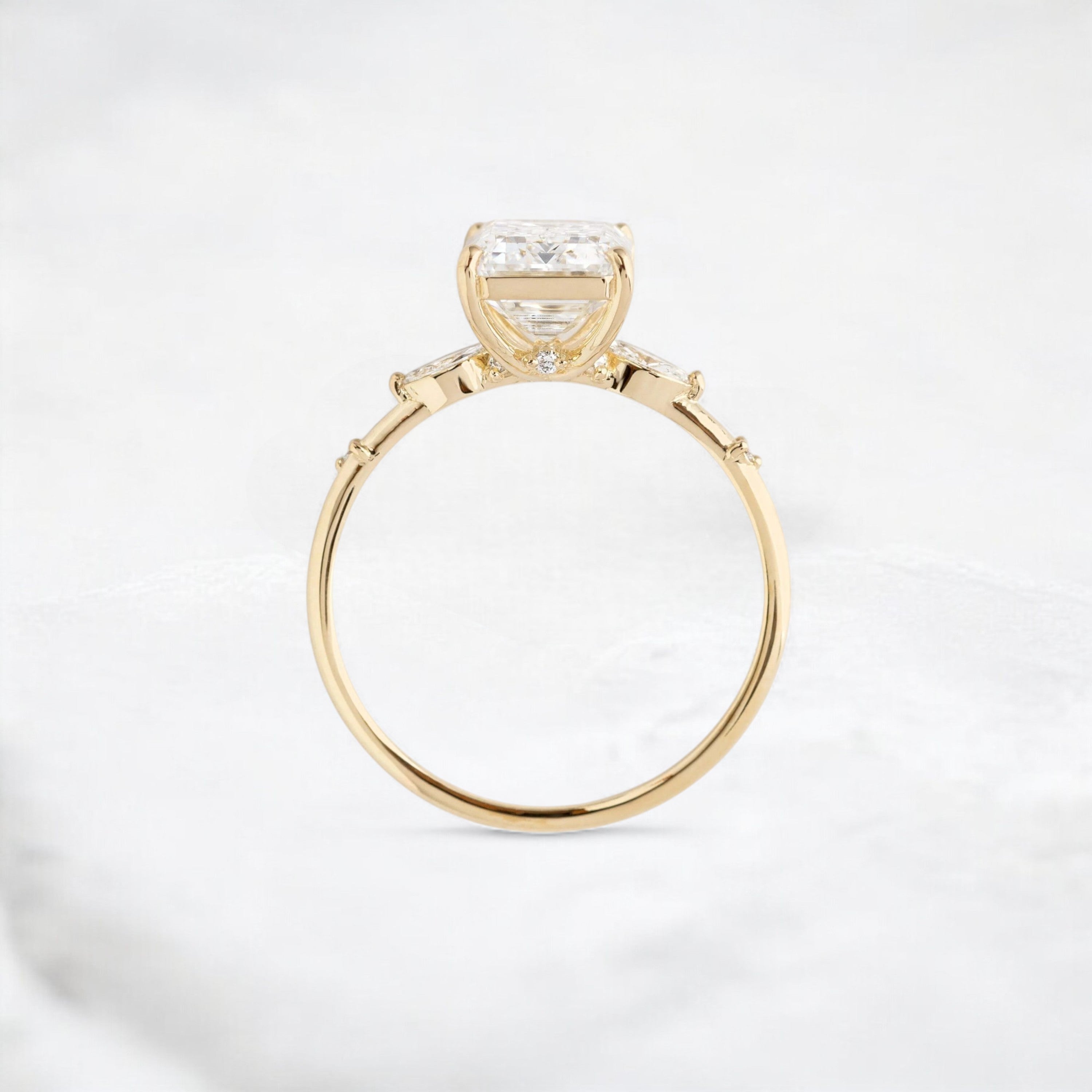 emerald-embrace-moissanite-engagement-solitaire-love-ring-2-70-ct-yellow-gold-gemfora-4