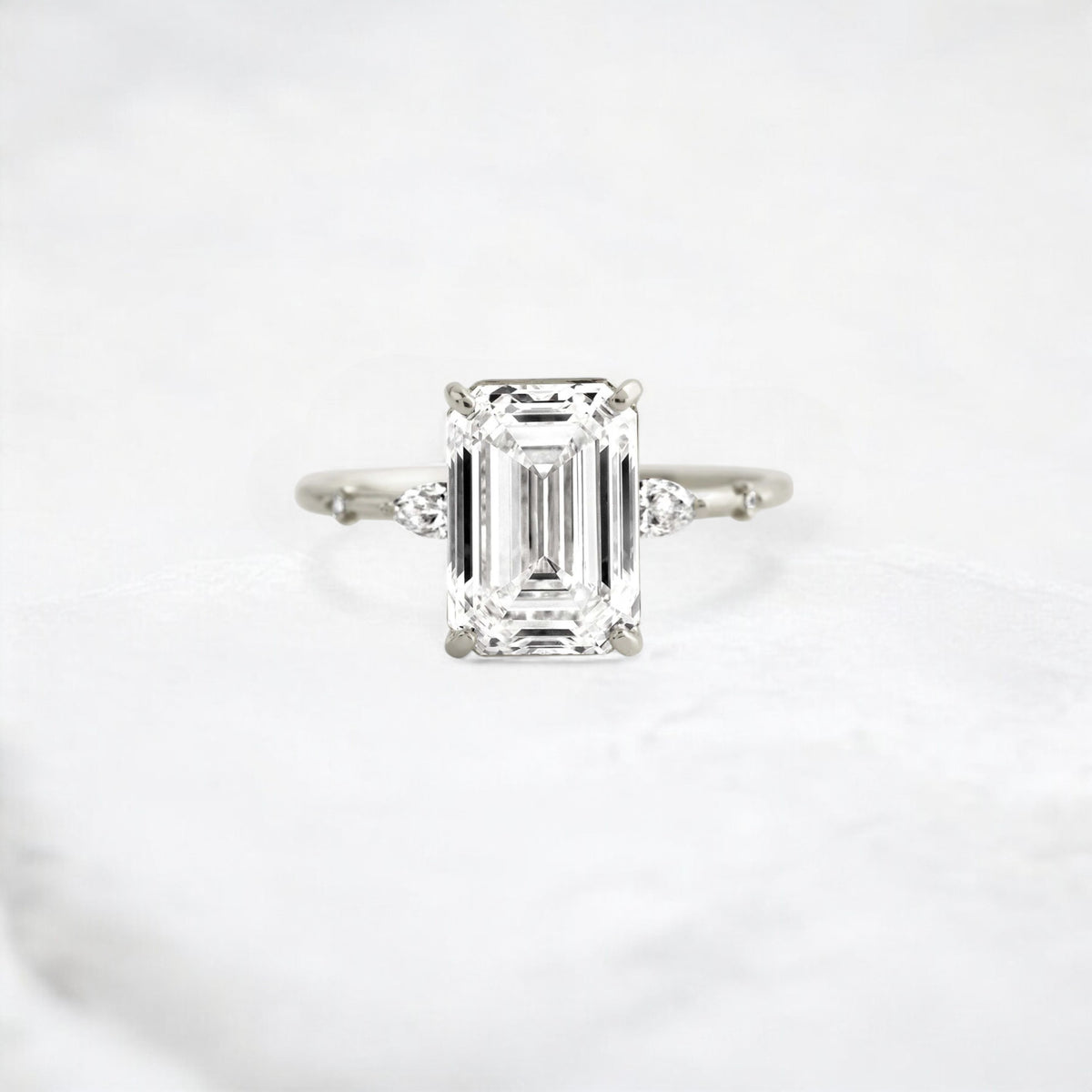 emerald-embrace-moissanite-engagement-solitaire-love-ring-3-5-ct-platinum-gemfora-1