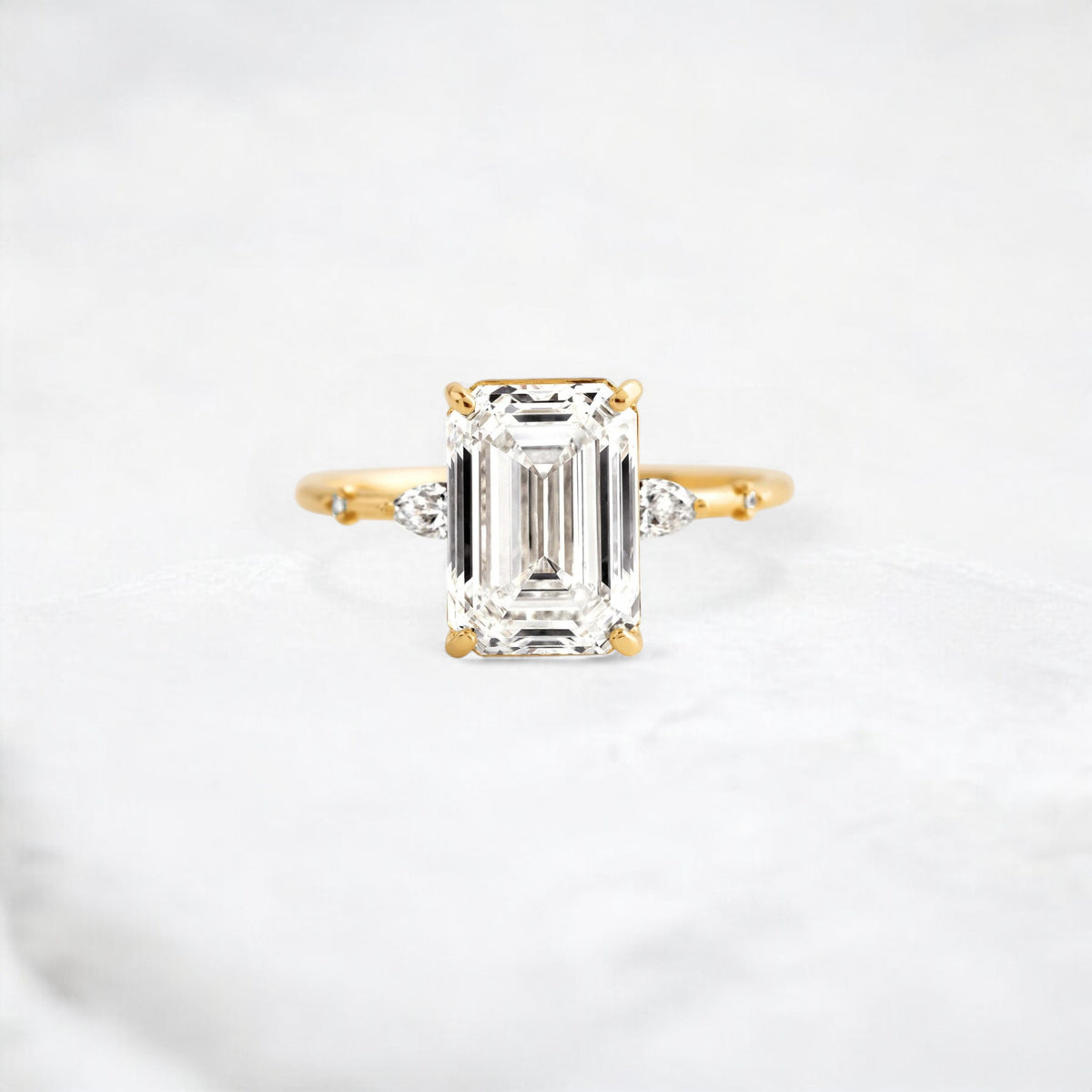 emerald-embrace-moissanite-engagement-solitaire-love-ring-3-5-ct-yellow-gold-gemfora-1