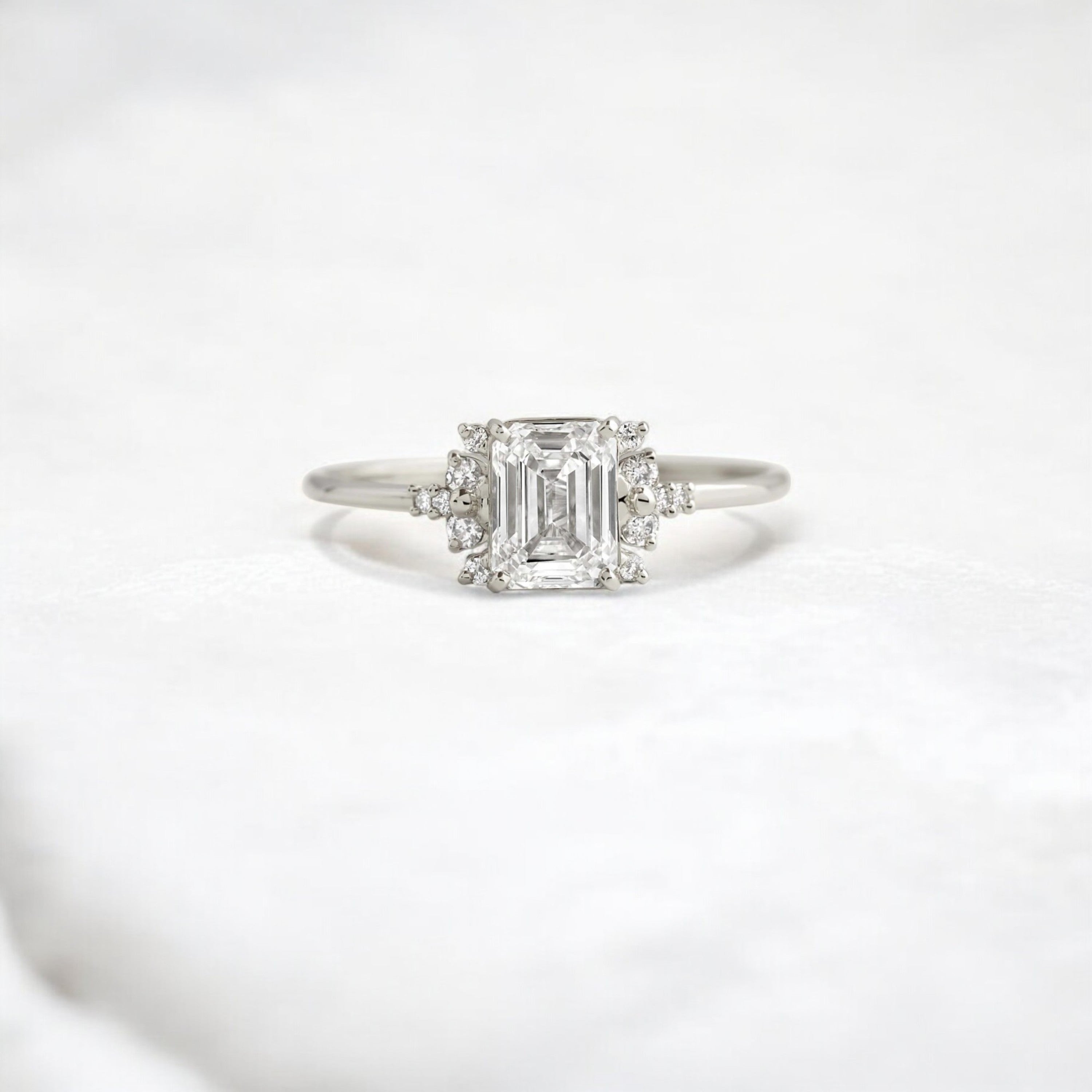 emerald-skyfall-moissanite-engagement-cluster-light-ring-1-ct-white-gold-gemfora-1