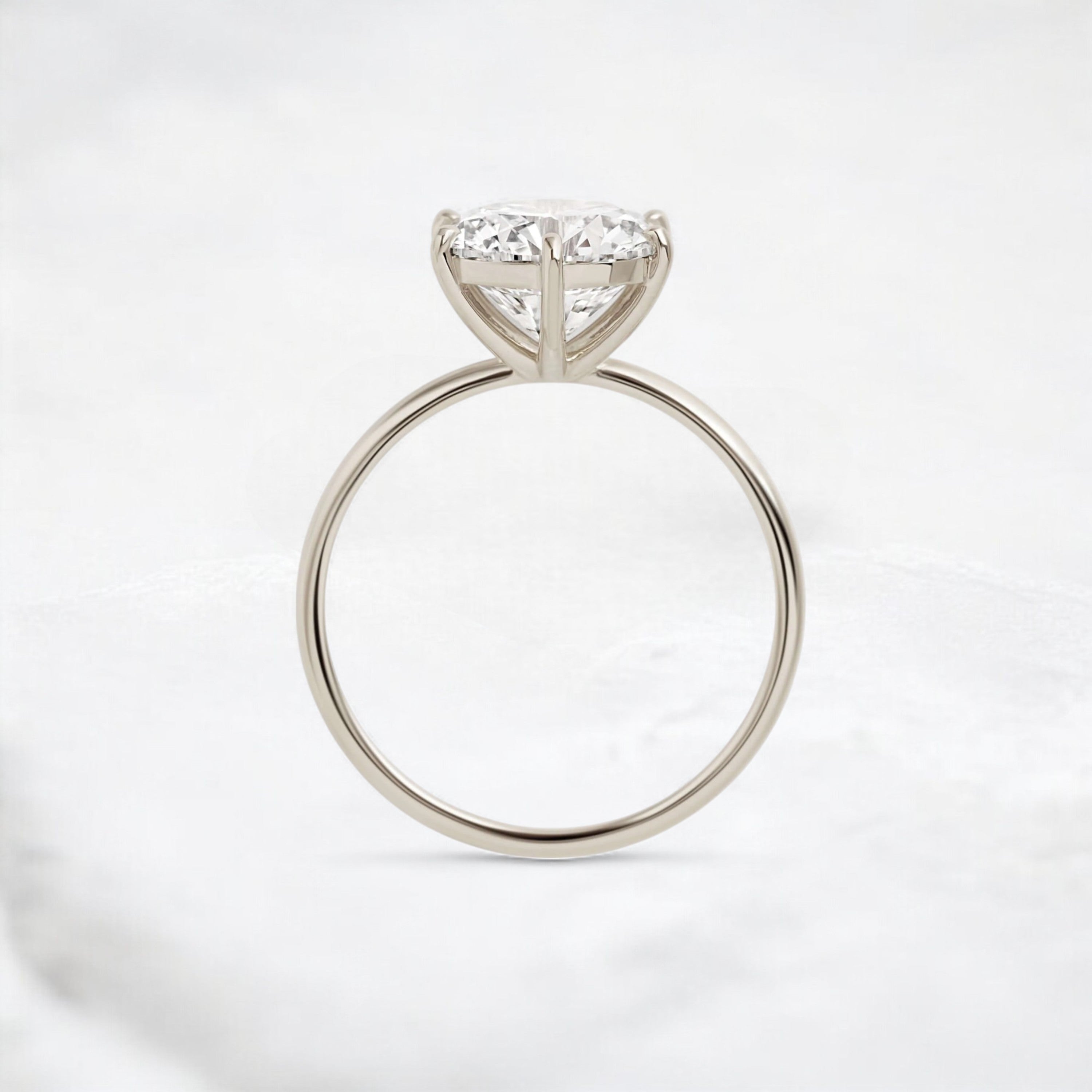 endless-love-round-moissanite-ring-in-golden-embrace-shine-2-4-ct-white-gold-gemfora-4