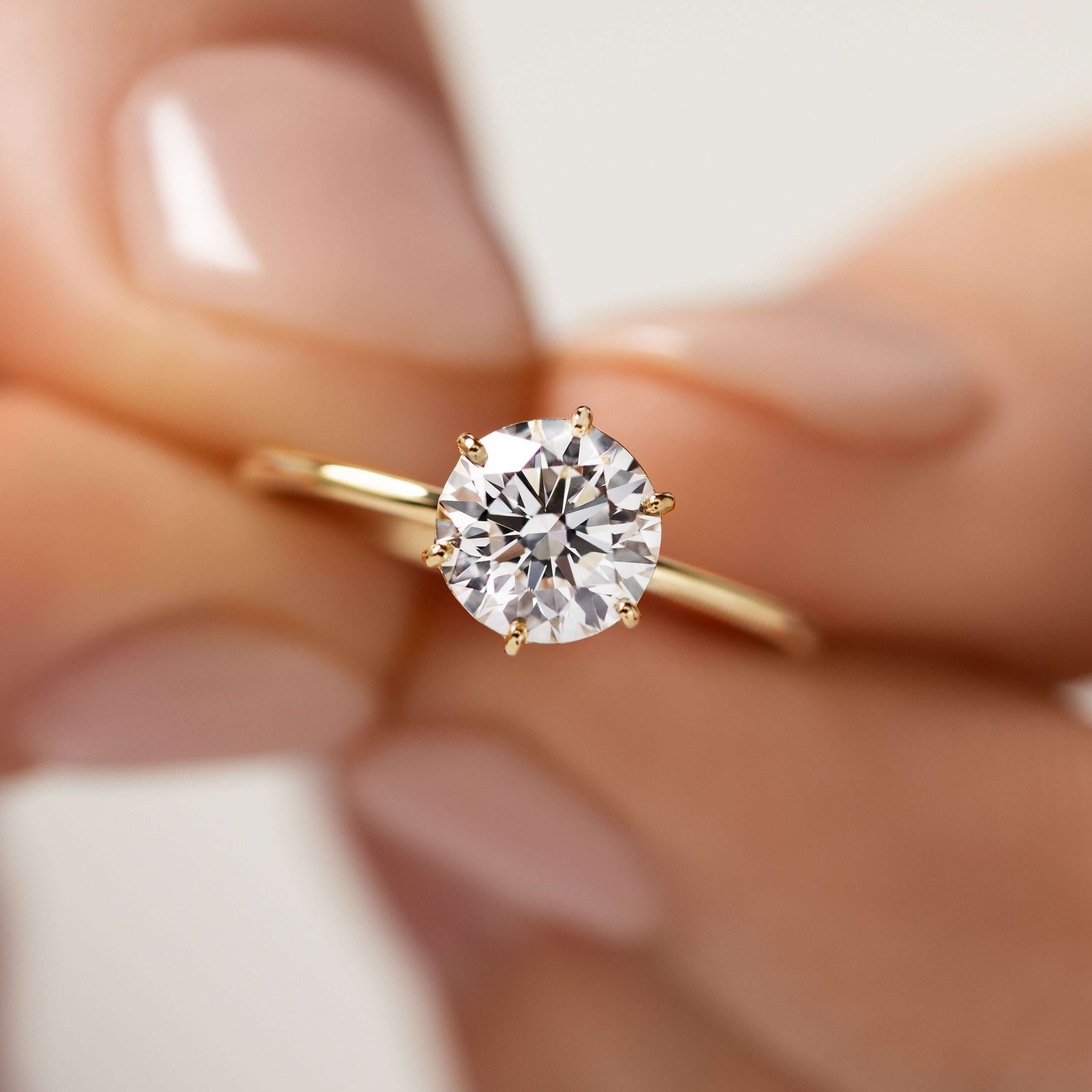 endless-love-round-moissanite-ring-in-golden-embrace-shine-model-1-21-ct-gemfora-1