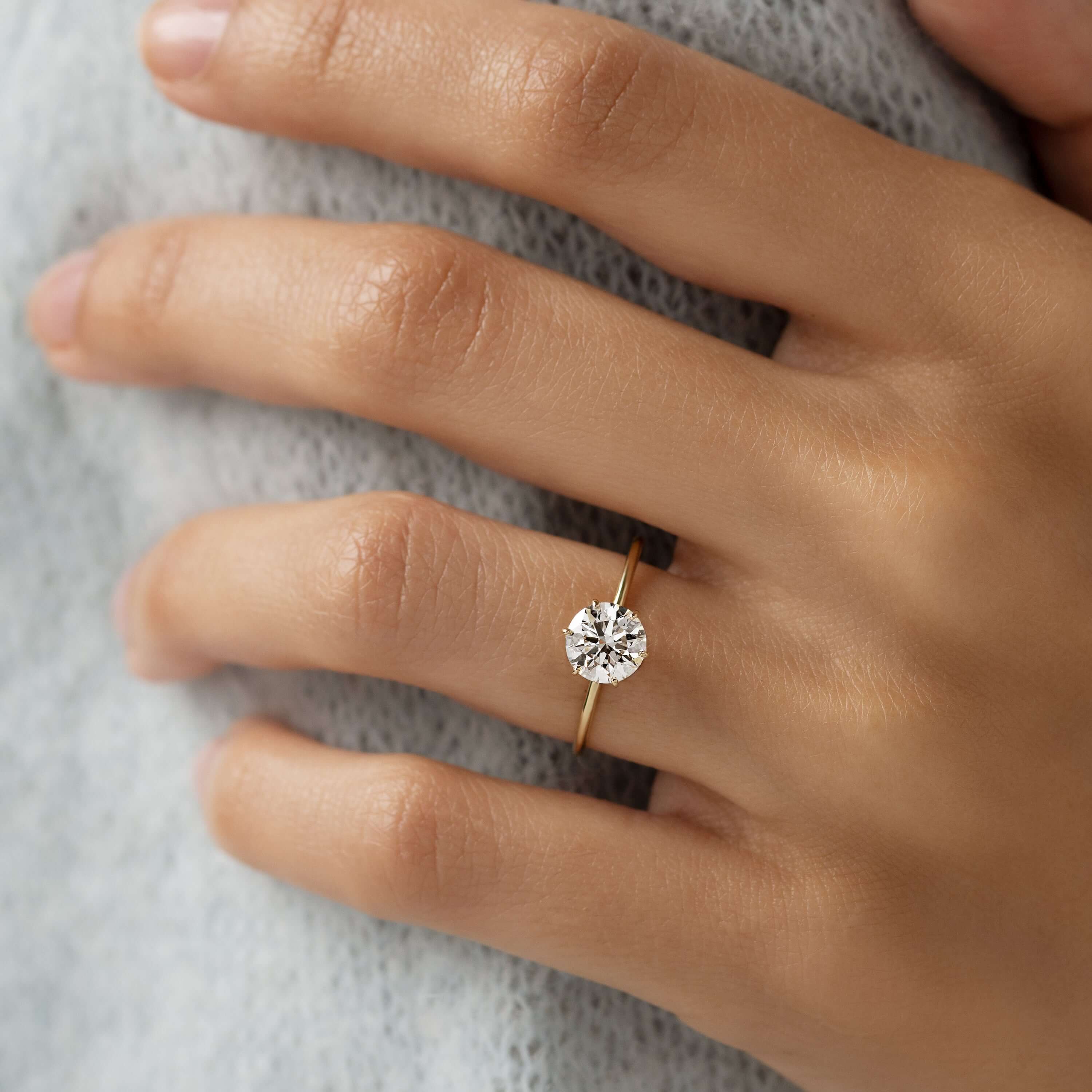 endless-love-round-moissanite-ring-in-golden-embrace-shine-model-1-ct-gemfora-1