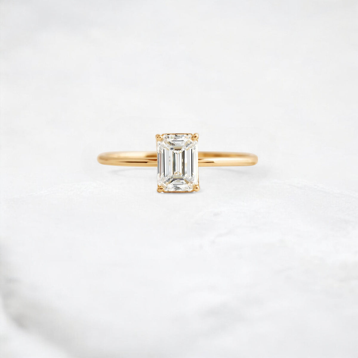 eternal-grace-emerald-solitaire-moissanite-engagement-ring-1-ct-yellow-gold-gemfora