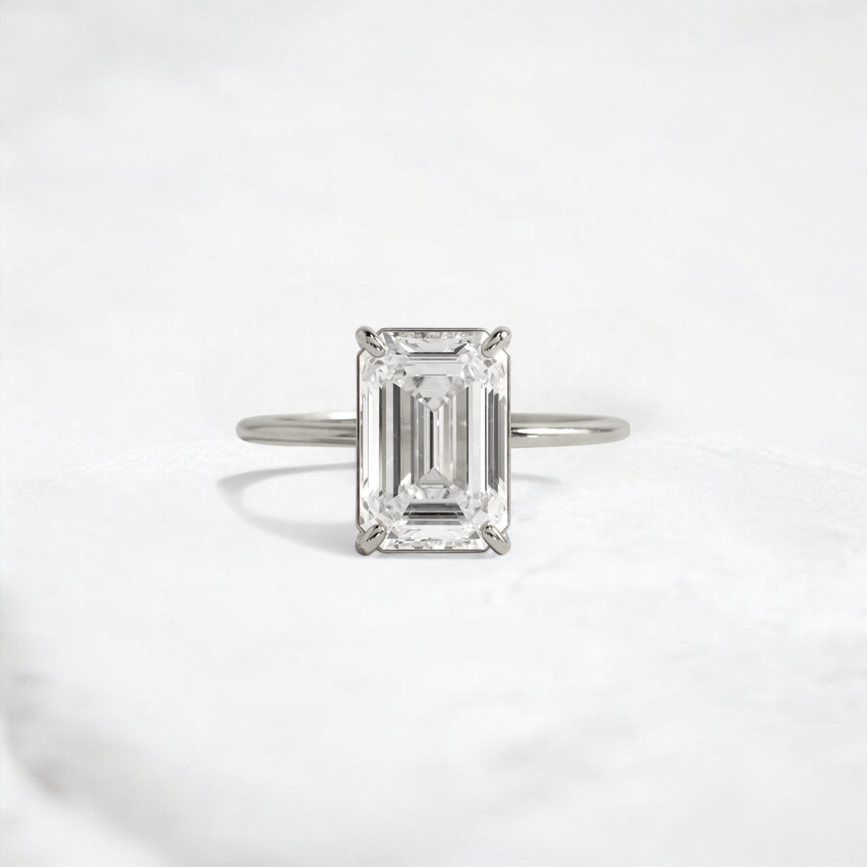 eternal-grace-emerald-solitaire-moissanite-engagement-ring-3-ct-platinum-gemfora-1