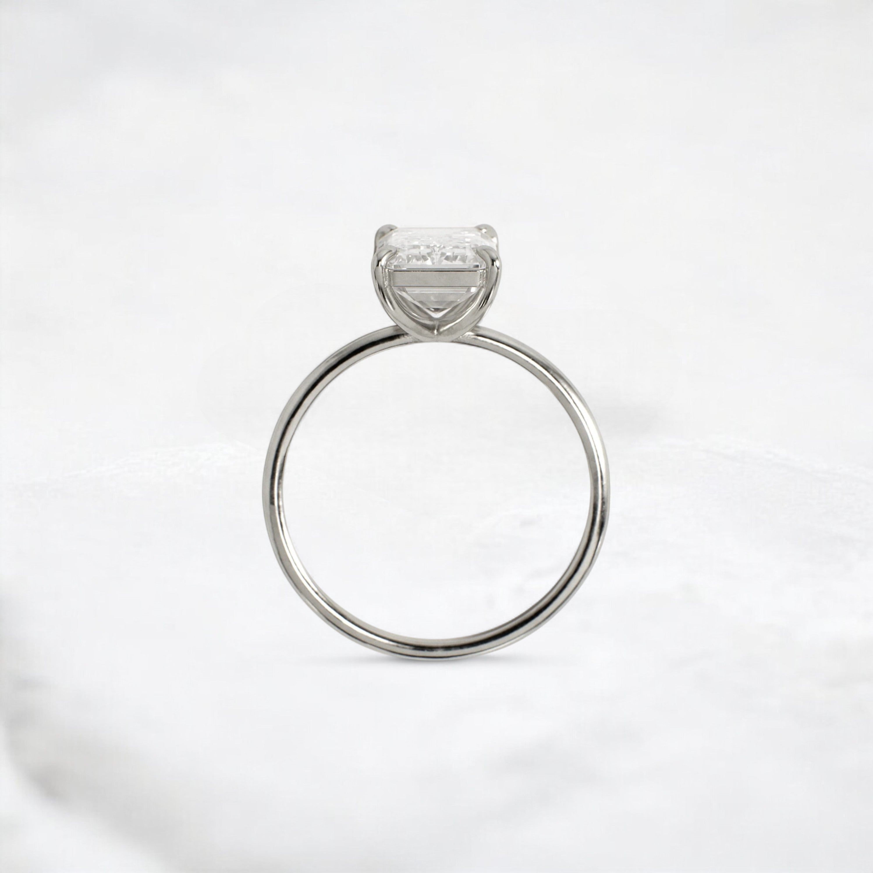 eternal-grace-emerald-solitaire-moissanite-engagement-ring-3-ct-platinum-gemfora-4