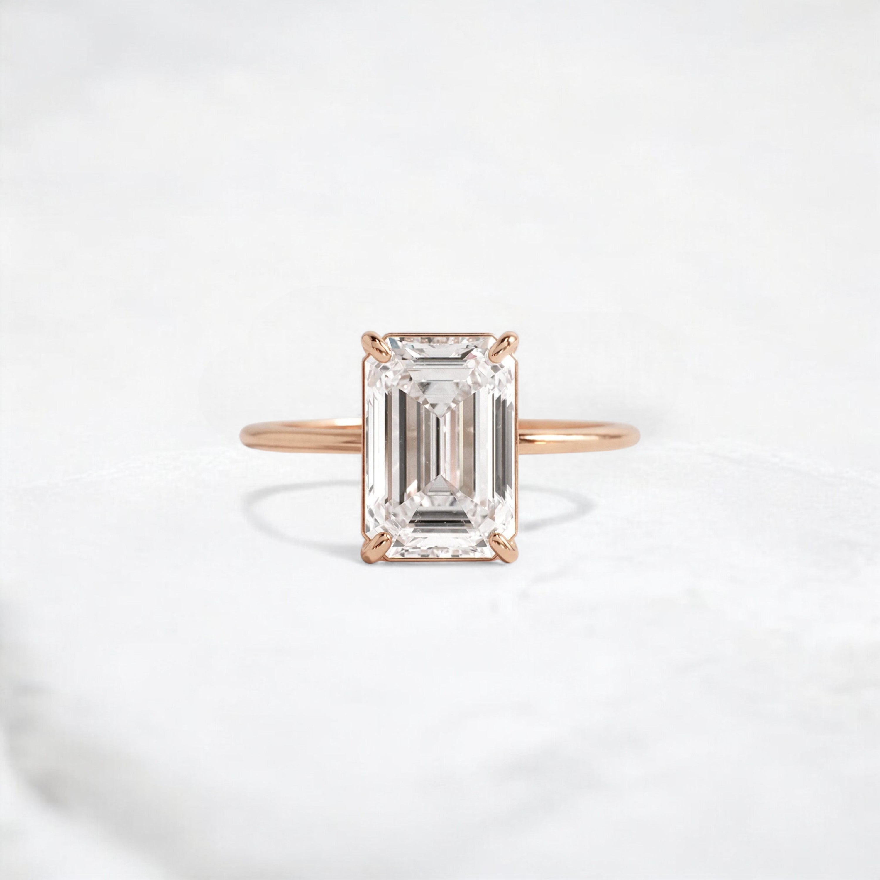 eternal-grace-emerald-solitaire-moissanite-engagement-ring-3-ct-rose-gold-gemfora-1
