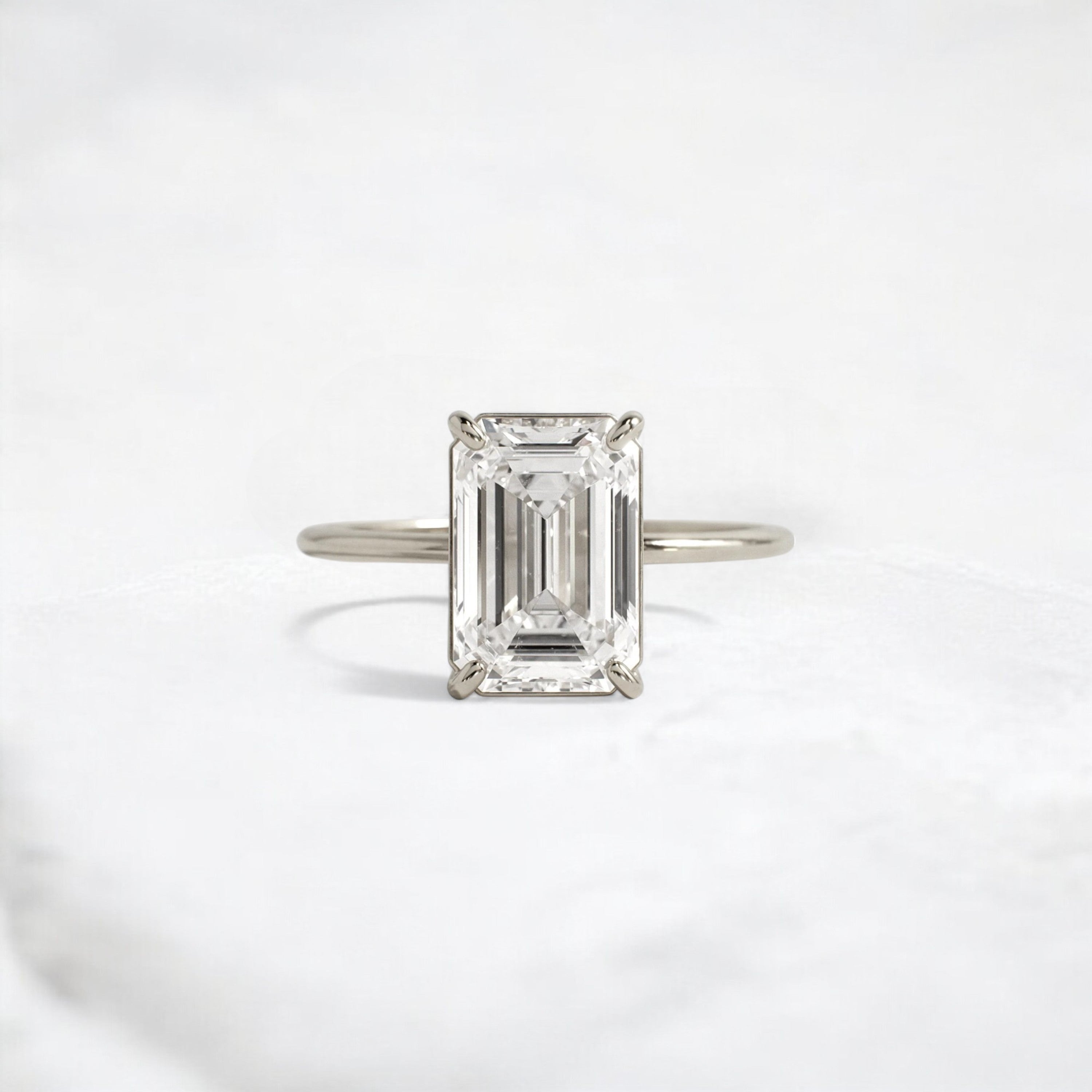 eternal-grace-emerald-solitaire-moissanite-engagement-ring-3-ct-white-gold-gemfora-1