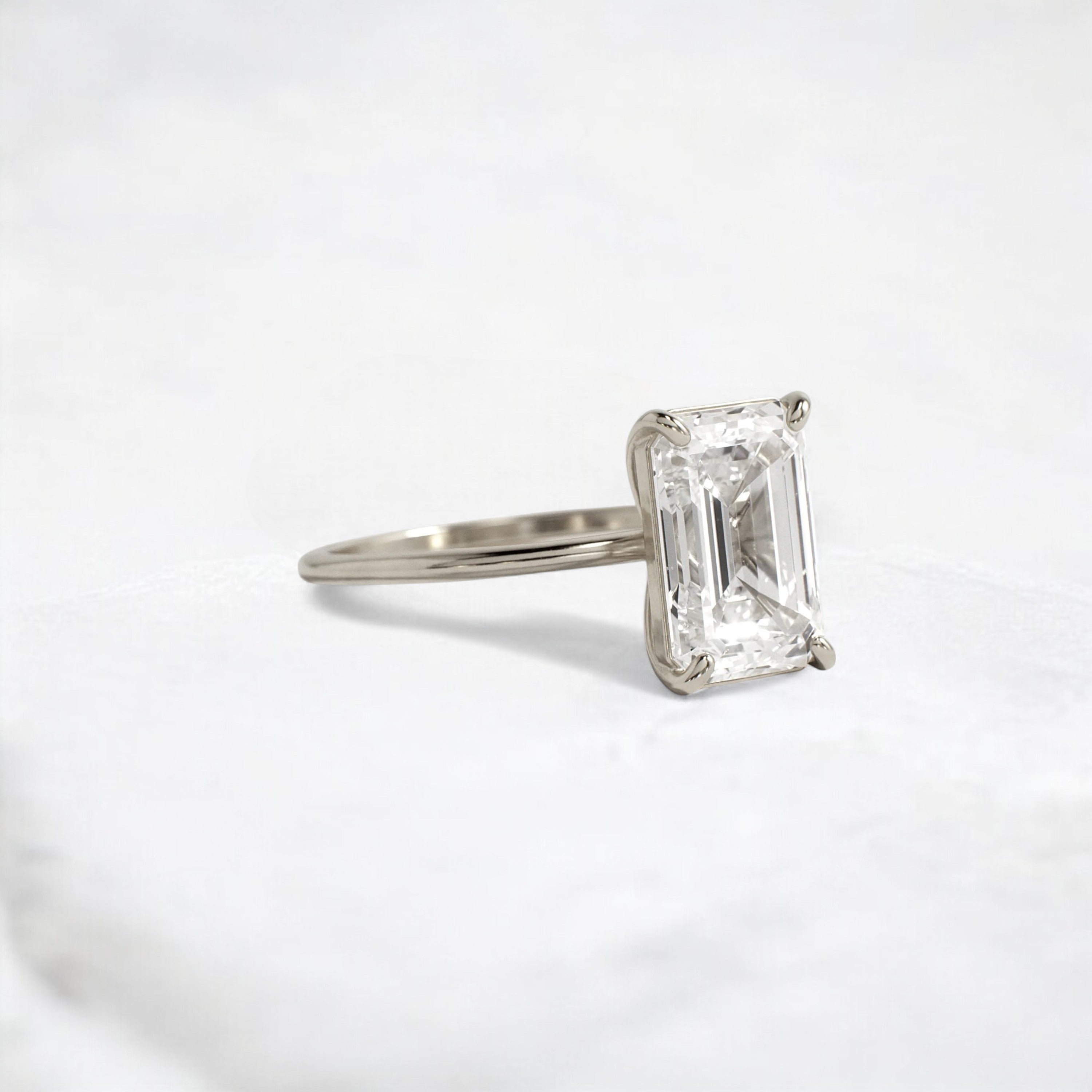 eternal-grace-emerald-solitaire-moissanite-engagement-ring-3-ct-white-gold-gemfora-2