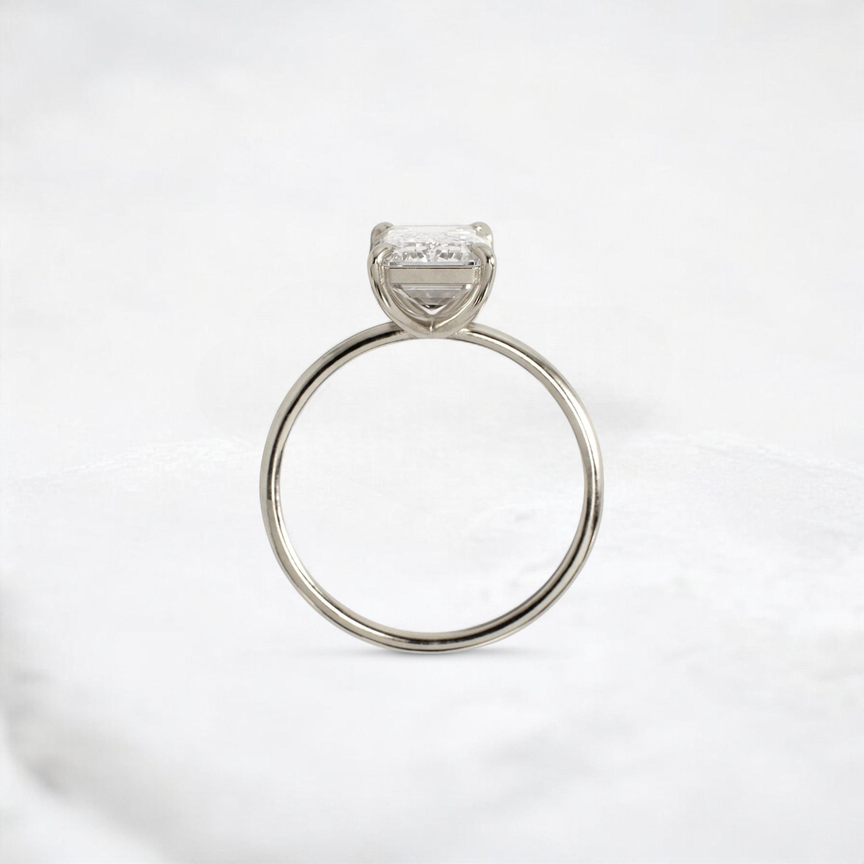 eternal-grace-emerald-solitaire-moissanite-engagement-ring-3-ct-white-gold-gemfora-4