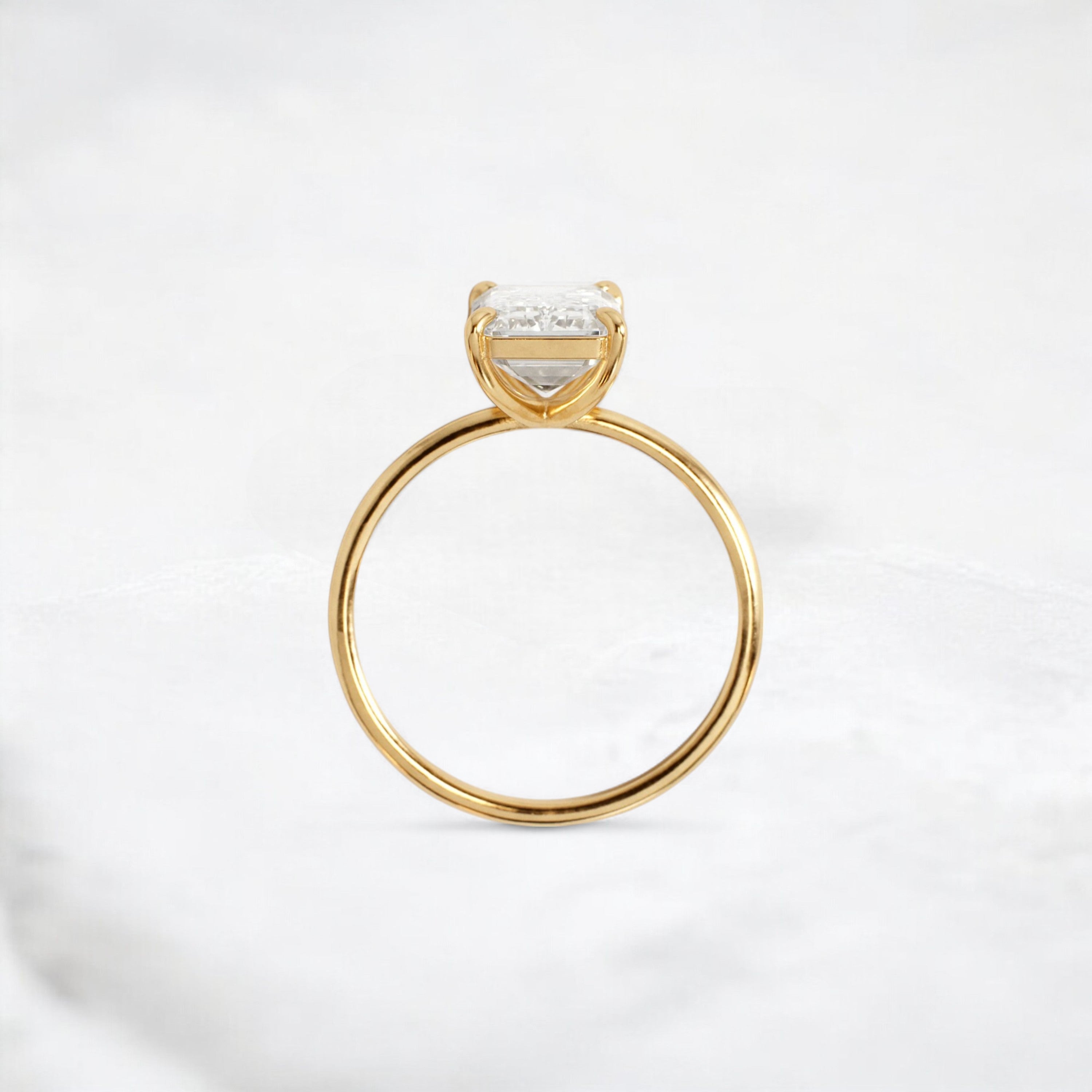 eternal-grace-emerald-solitaire-moissanite-engagement-ring-3-ct-yellow-gold-gemfora-4