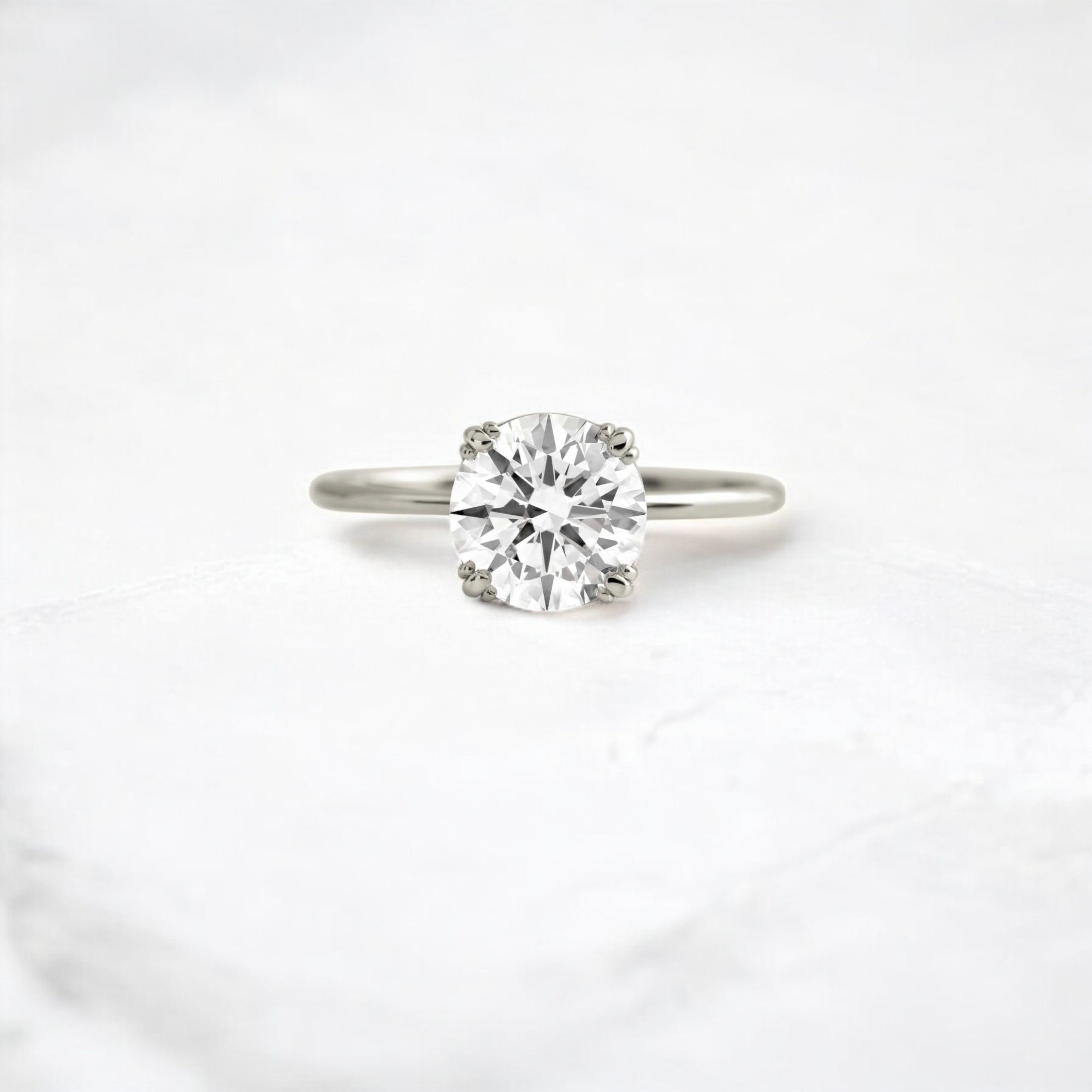 eternal-light-round-cut-moissanite-ring-4-prong-in-gold-shine-1-66-ct-platinum-gemfora-1