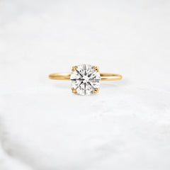 eternal-light-round-cut-moissanite-ring-4-prong-in-gold-shine-1-66-ct-yellow-gemfora-1