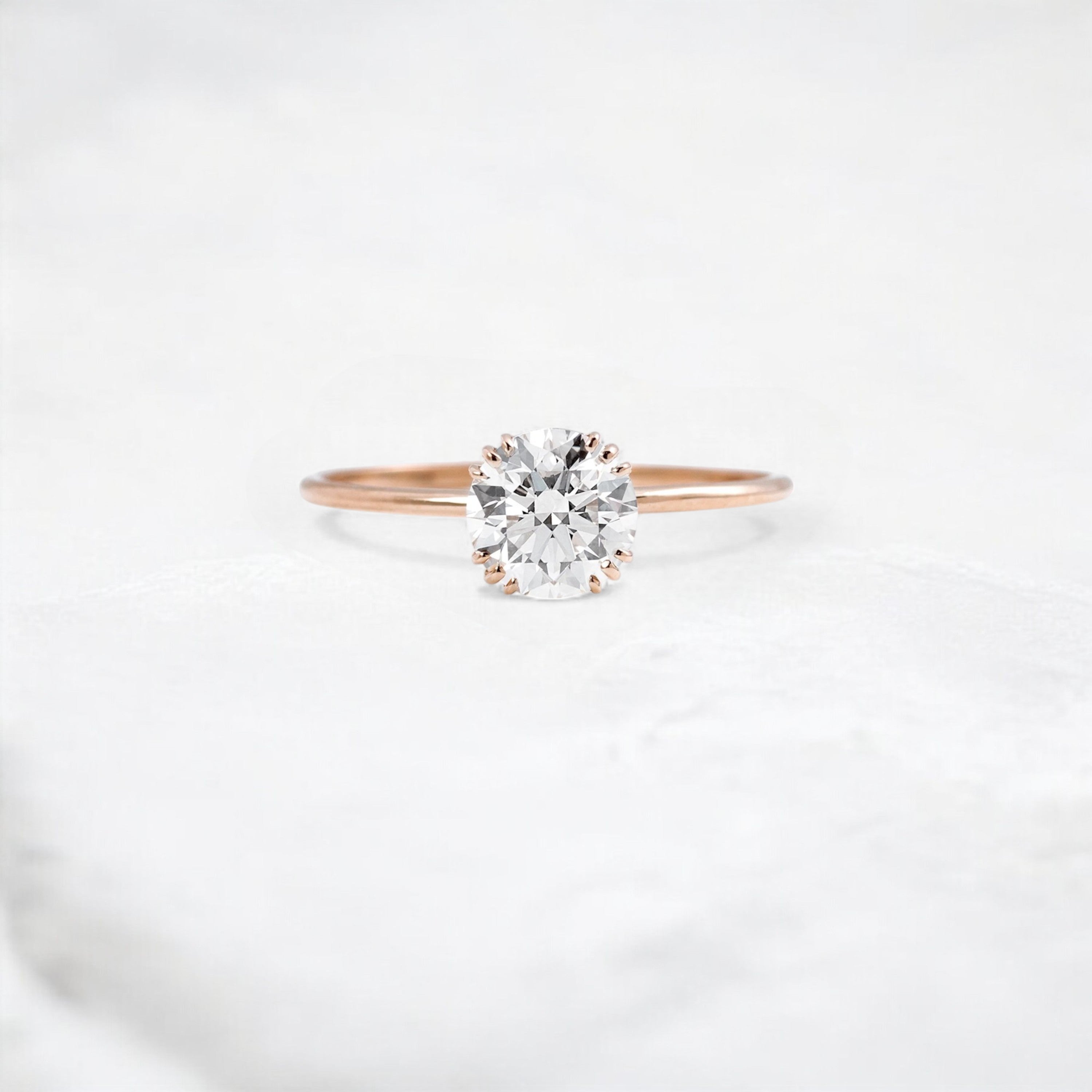 eternal-light-round-cut-moissanite-ring-4-prong-in-gold-shine-1-ct-rose-gemfora-1