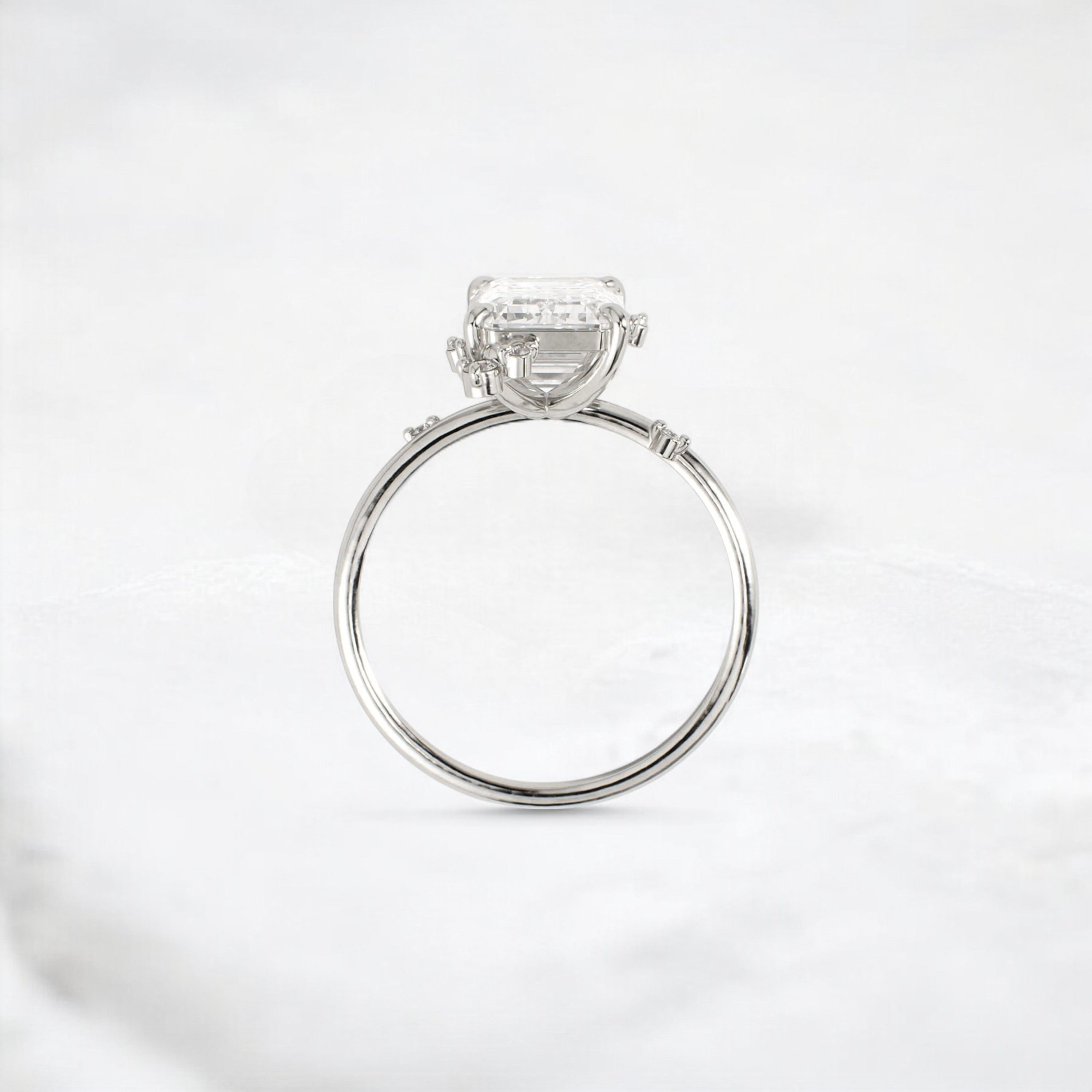 flameleaf-embrace-emerald-spark-moissanite-engagement-ring-3-ct-platinum-gemfora-4