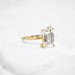 flameleaf-embrace-emerald-spark-moissanite-engagement-ring-3-ct-yellow-gold-gemfora-2