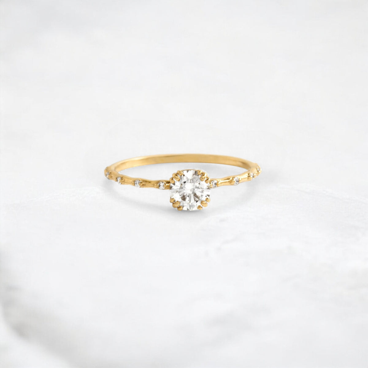 golden-lace-round-cut-pave-moissanite-engagement-ring-0-5-ct-yellow-gold-gemfora-1