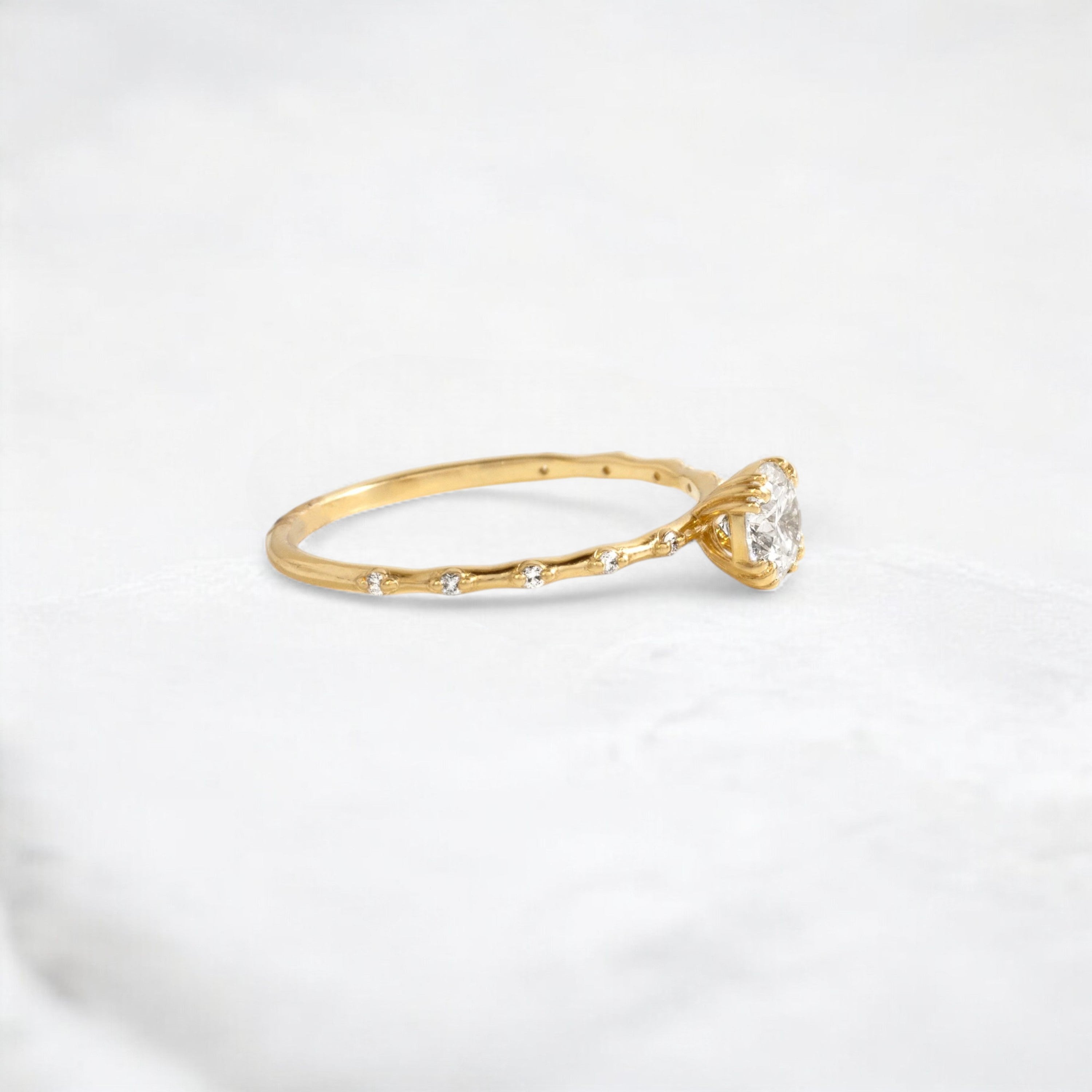 golden-lace-round-cut-pave-moissanite-engagement-ring-0-5-ct-yellow-gold-gemfora-2