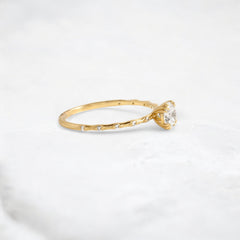 golden-lace-round-cut-pave-moissanite-engagement-ring-0-5-ct-yellow-gold-gemfora-2