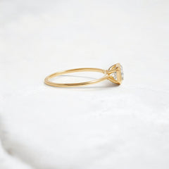 Elegant handmade emerald cut diamond engagement ring, featuring a bezel setting designed for women.