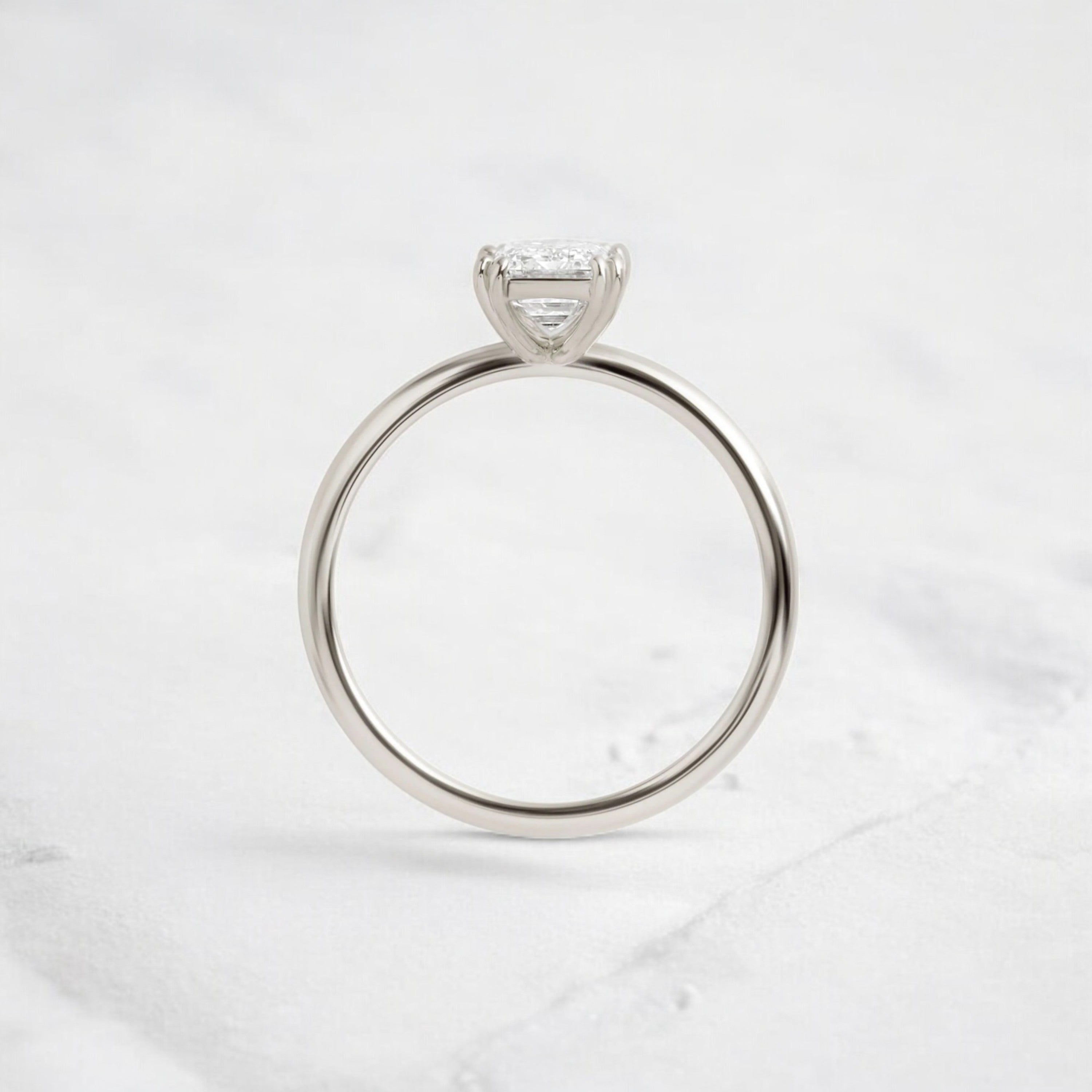 handmade-double-prong-emerald-solitaire-moissanite-engagement-ring-0-90-ct-platinum-gemfora