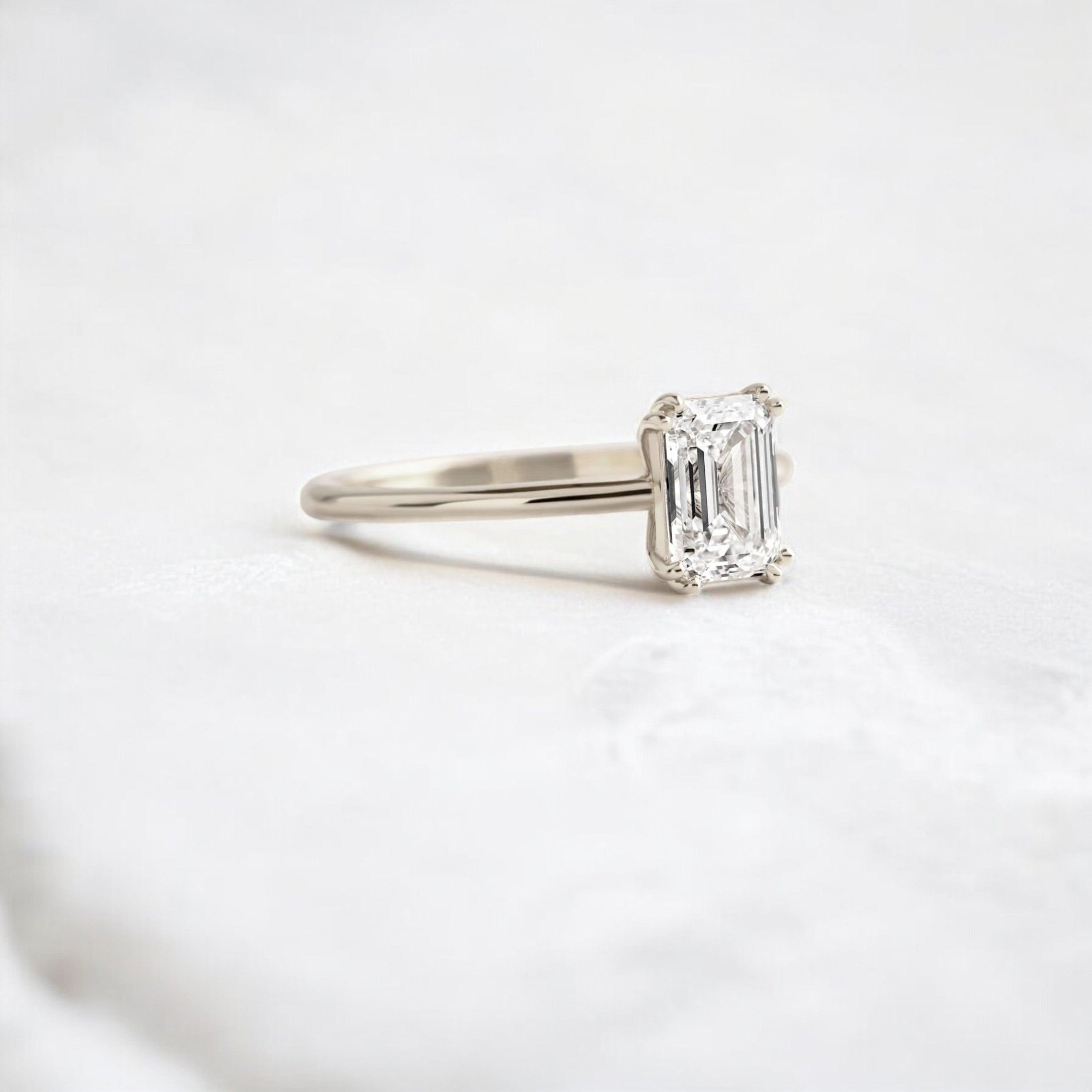 handmade-double-prong-emerald-solitaire-moissanite-engagement-ring-0-90-ct-white-gold-gemfora