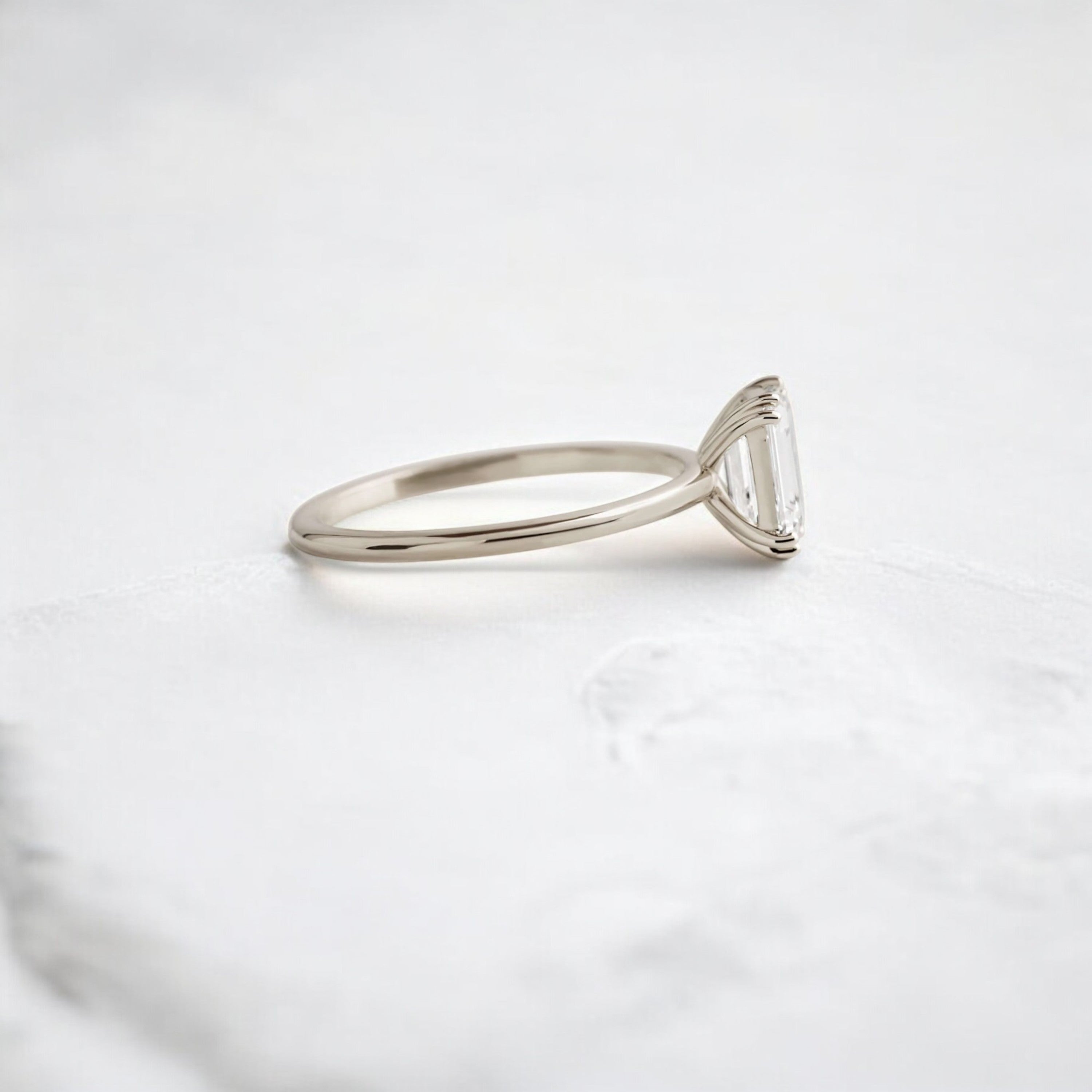 handmade-double-prong-emerald-solitaire-moissanite-engagement-ring-0-90-ct-white-gold-gemfora