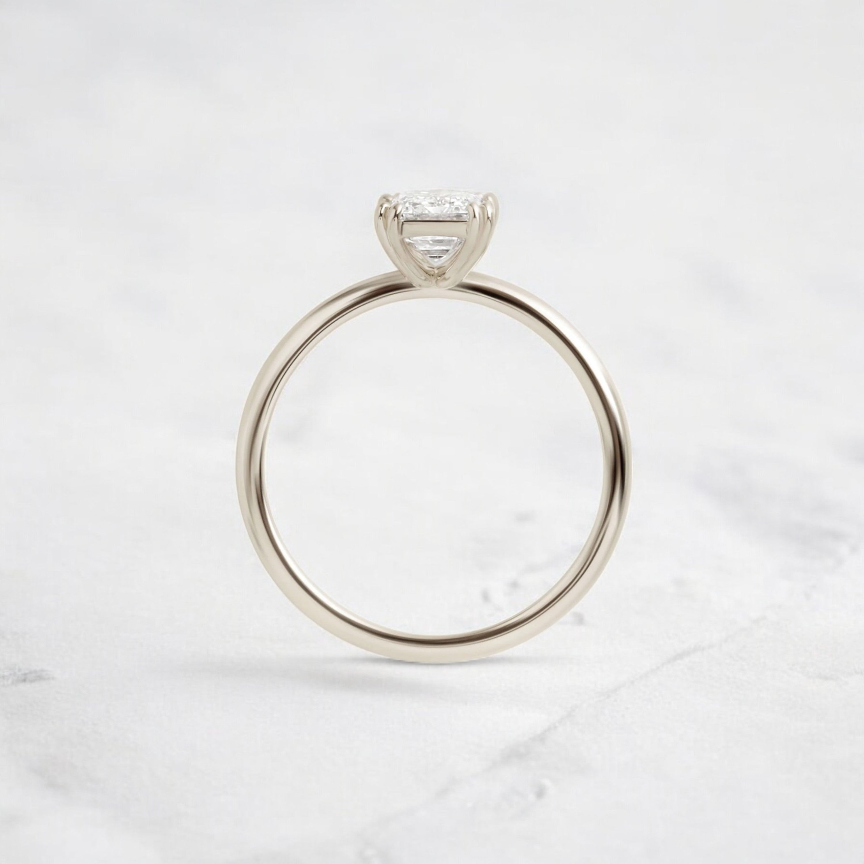 handmade-double-prong-emerald-solitaire-moissanite-engagement-ring-0-90-ct-white-gold-gemfora
