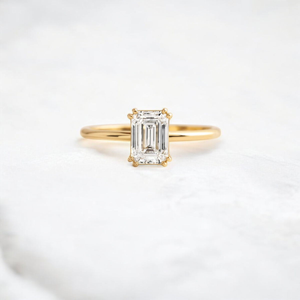 handmade-double-prong-emerald-solitaire-moissanite-engagement-ring-0-90-ct-yellow-gold-gemfora