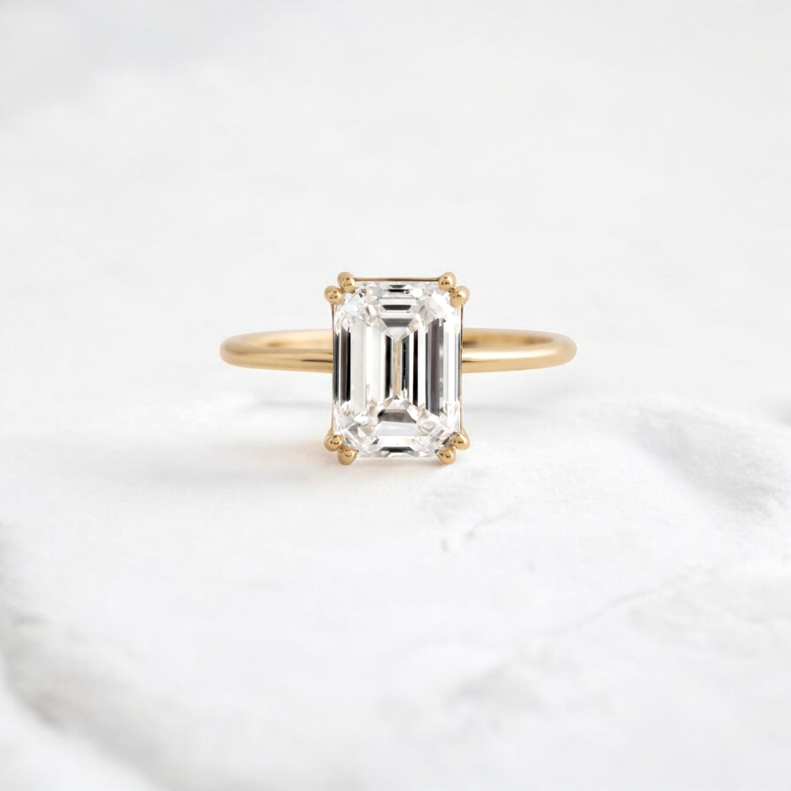 handmade-double-prong-emerald-solitaire-moissanite-engagement-ring-1-70-ct-yellow-gold-gemfora