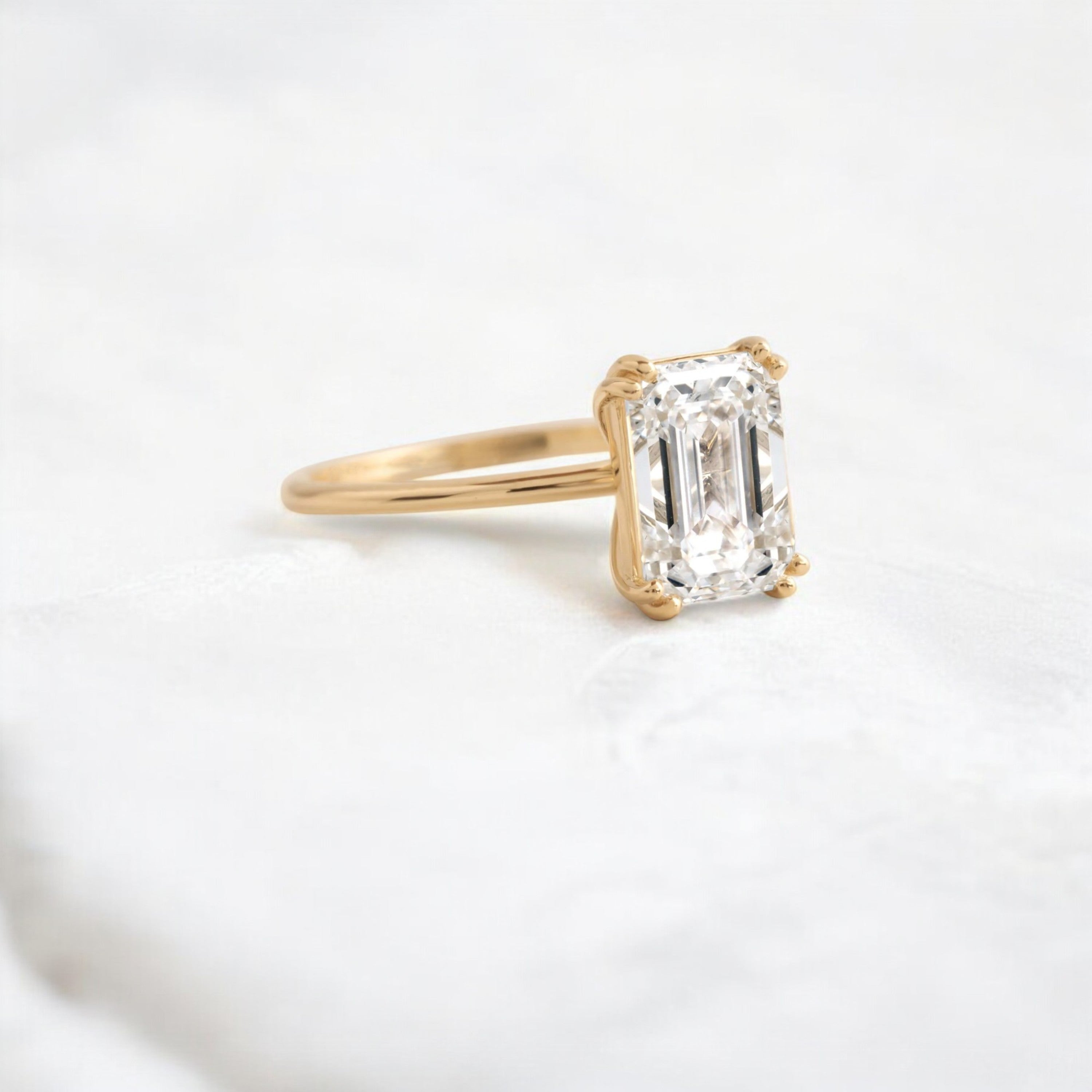 handmade-double-prong-emerald-solitaire-moissanite-engagement-ring-1-70-ct-yellow-gold-gemfora