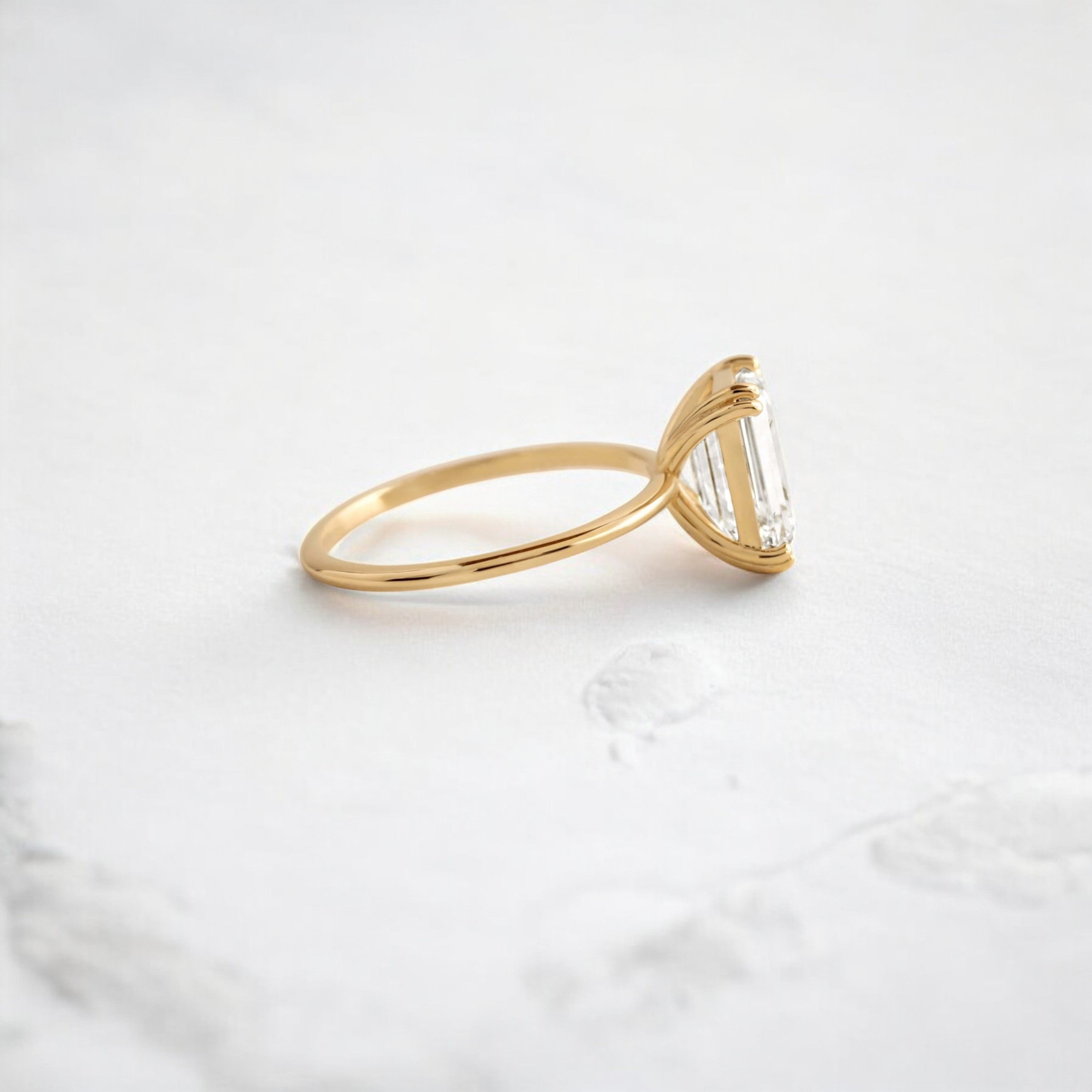 handmade-double-prong-emerald-solitaire-moissanite-engagement-ring-1-70-ct-yellow-gold-gemfora