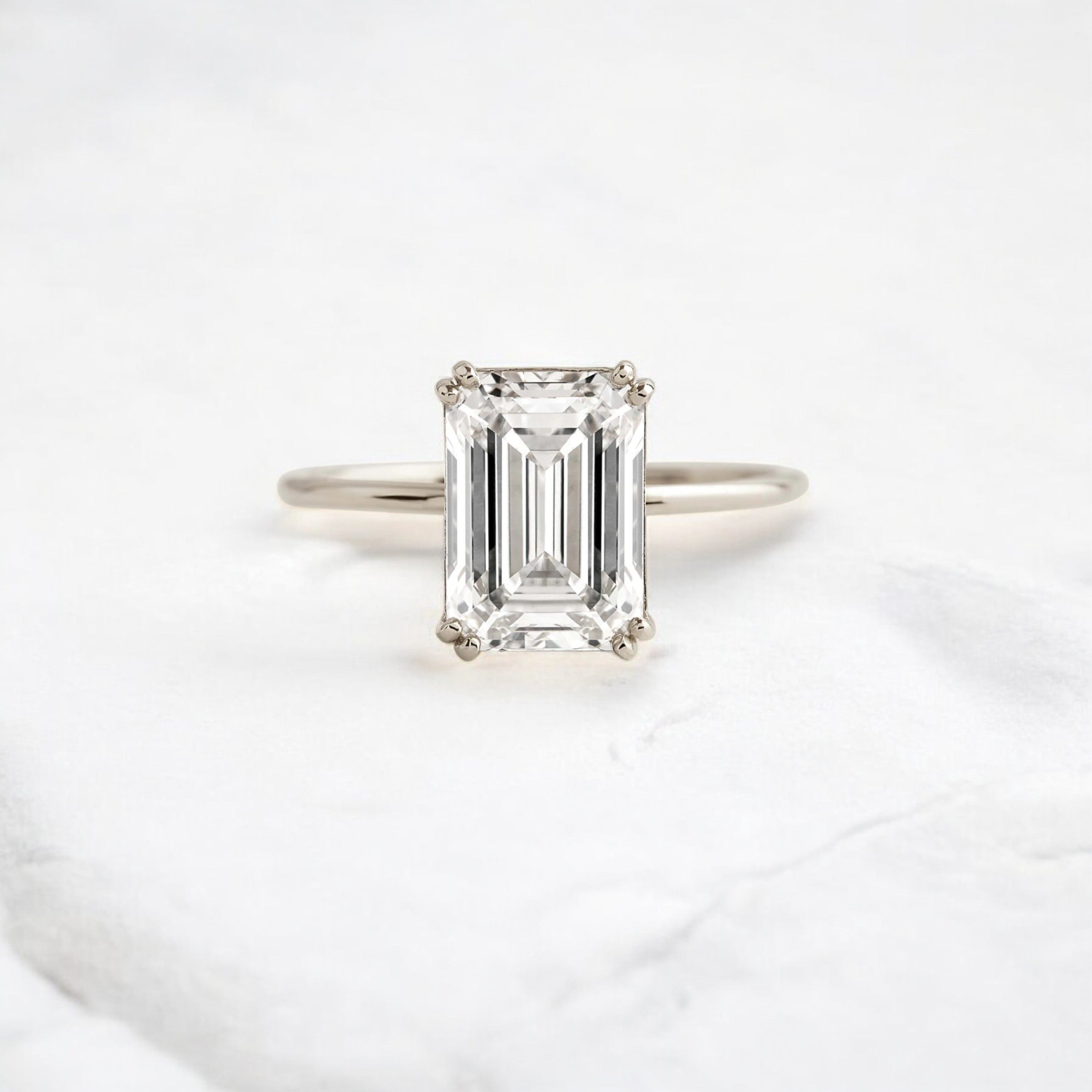 handmade-double-prong-emerald-solitaire-moissanite-engagement-ring-3-05-ct-white-gold-gemfora