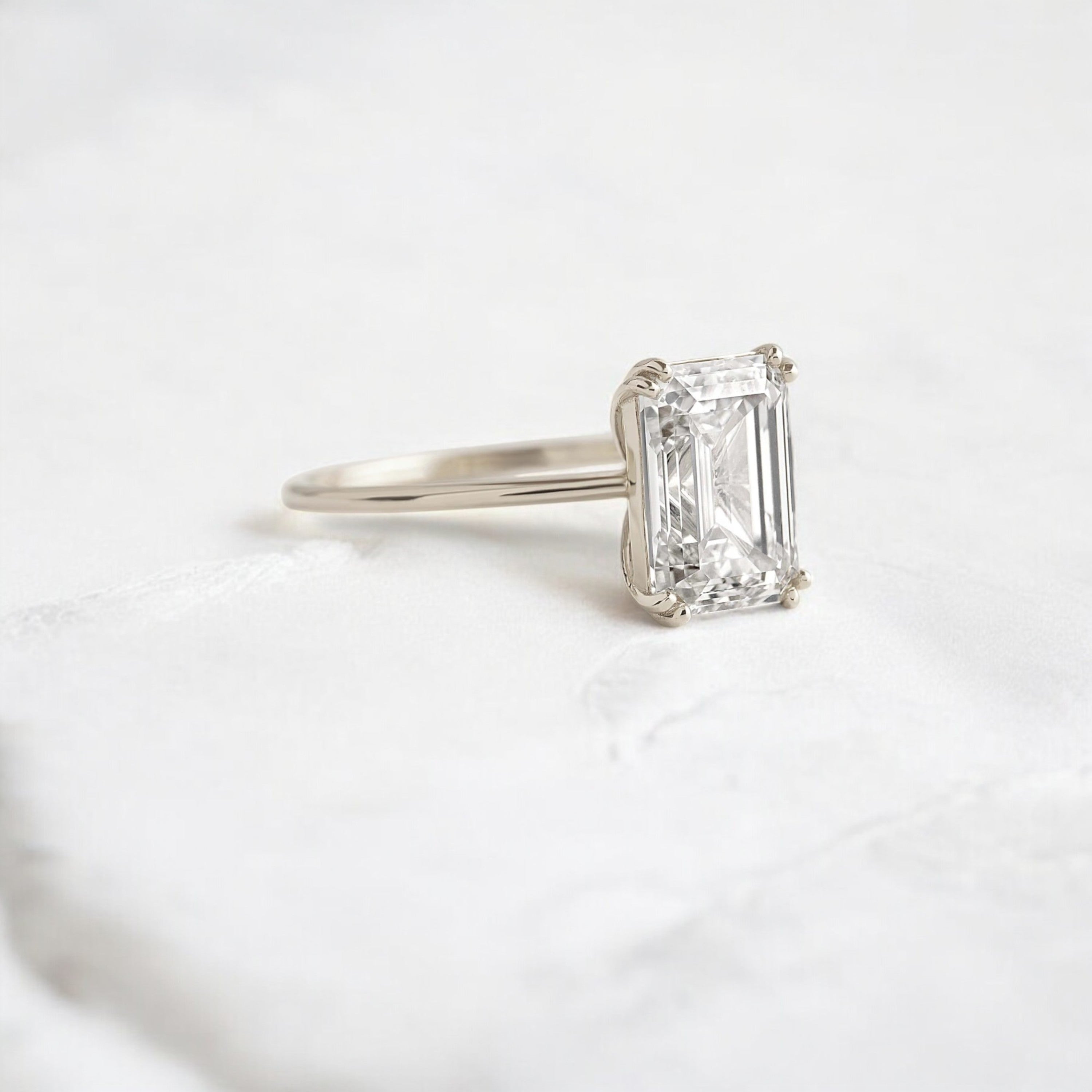handmade-double-prong-emerald-solitaire-moissanite-engagement-ring-3-05-ct-white-gold-gemfora