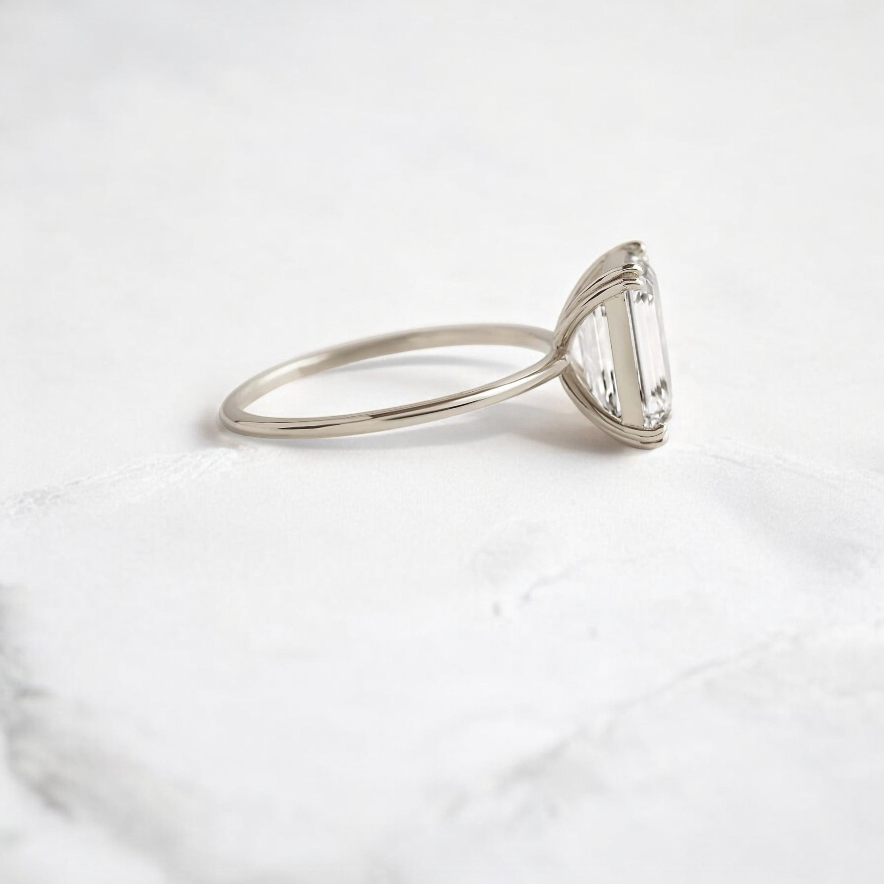 handmade-double-prong-emerald-solitaire-moissanite-engagement-ring-3-05-ct-white-gold-gemfora